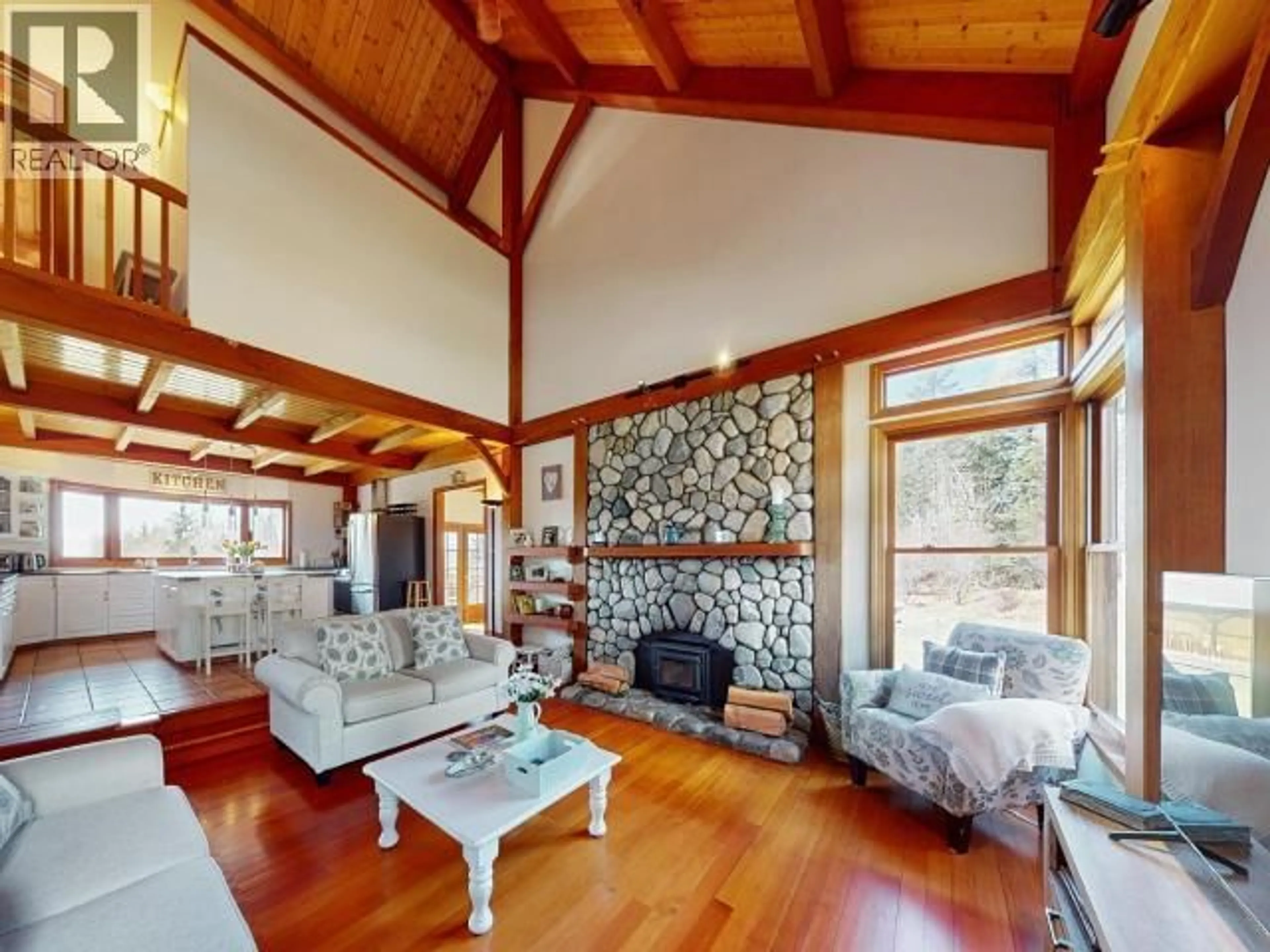 Living room with furniture, wood/laminate floor for 3749 HIGHWAY 101, Powell River British Columbia V8A0E2