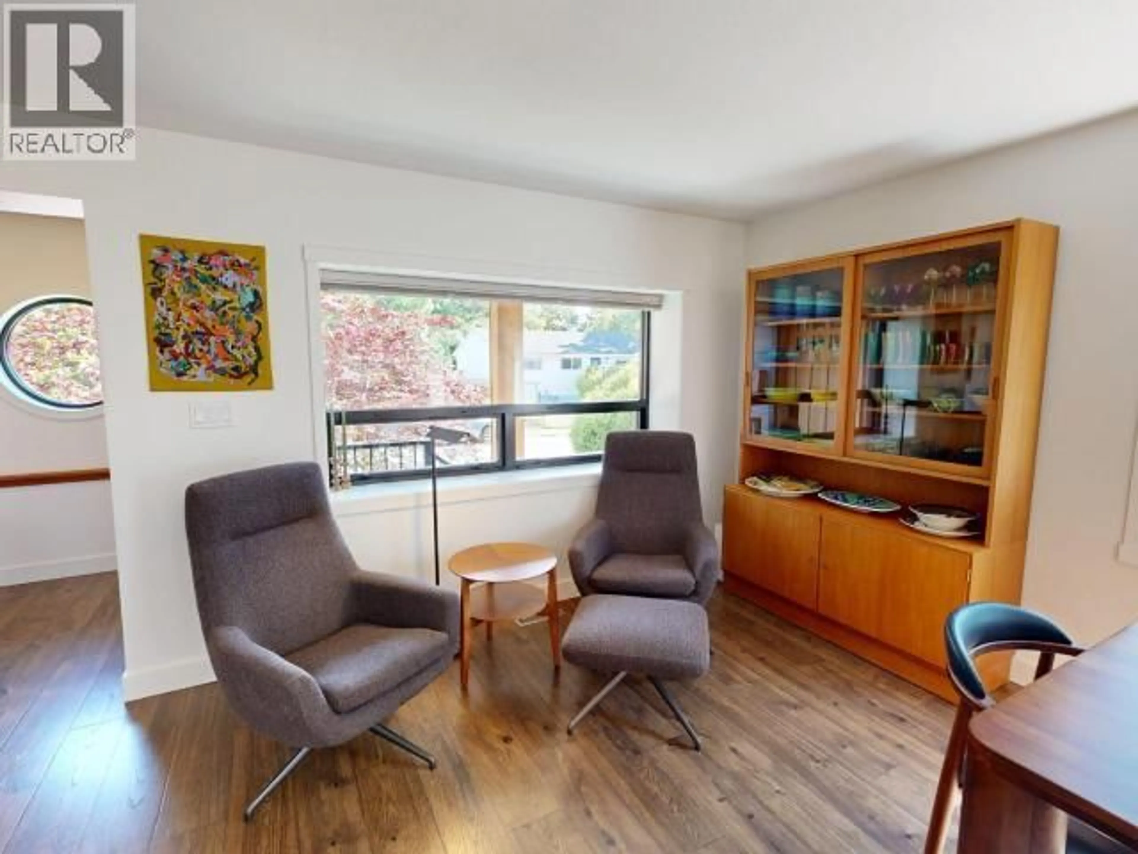 Living room with furniture, wood/laminate floor for 6865 GERRARD STREET, Powell River British Columbia V8A1S4
