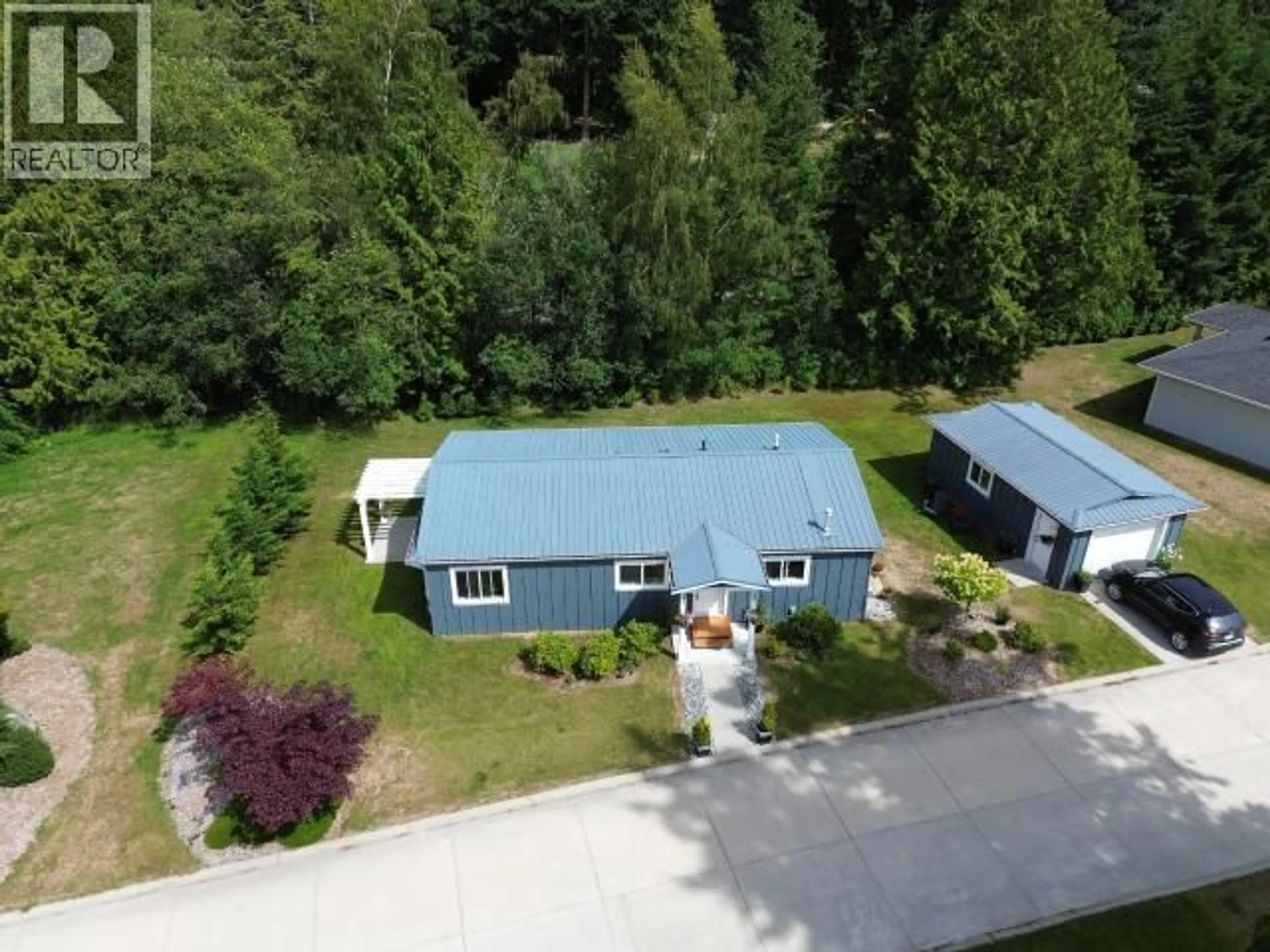 A pic from outside/outdoor area/front of a property/back of a property/a pic from drone, street for 101 - 7440 NOOTKA STREET, Powell River British Columbia V8A0P8