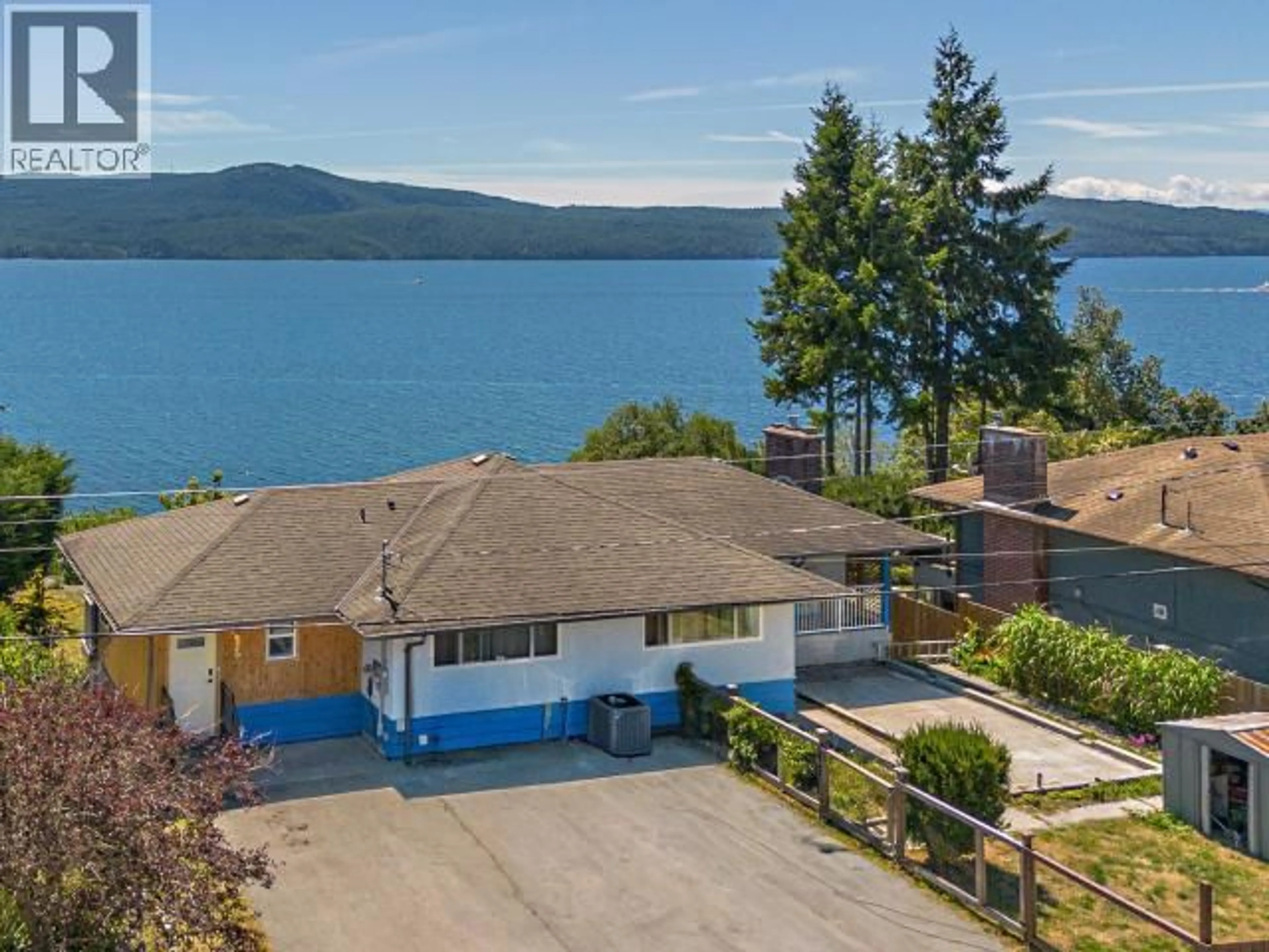 A pic from outside/outdoor area/front of a property/back of a property/a pic from drone, water/lake/river/ocean view for 9449 STITTLE ROAD, Powell River British Columbia