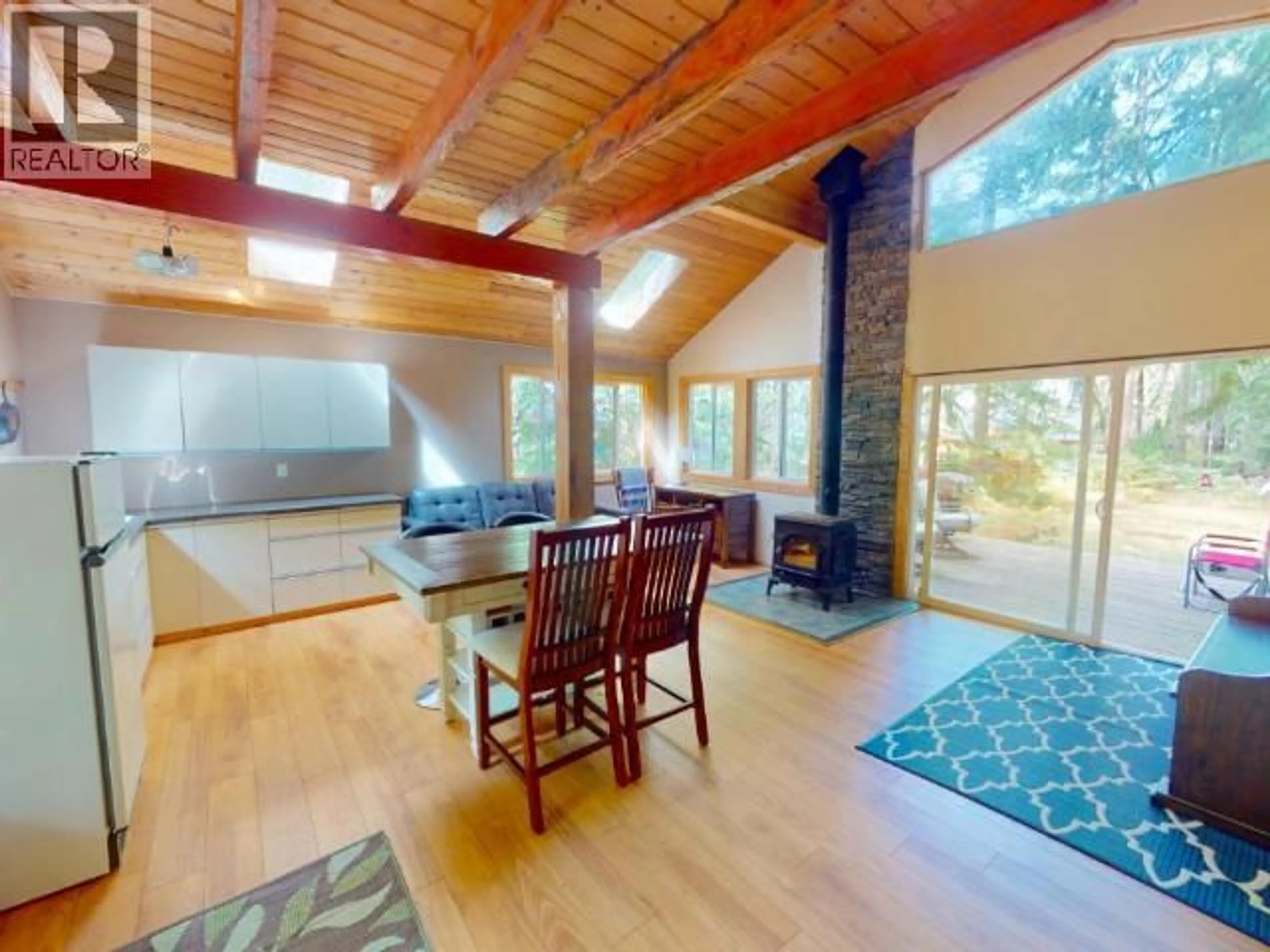 Open concept kitchen, wood/laminate floor for 1643 VANCOUVER BLVD, Savary Island British Columbia