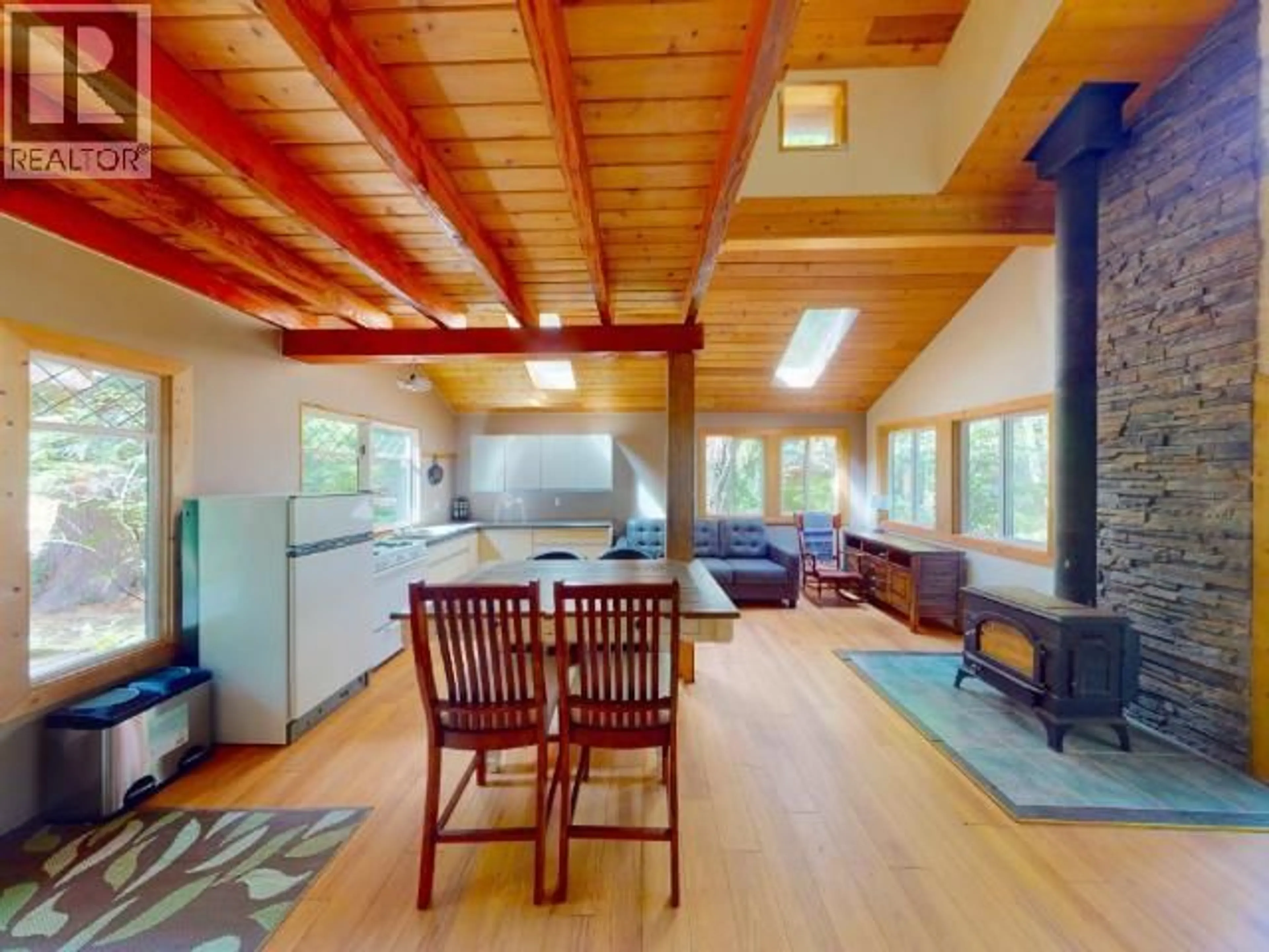 Living room with furniture, wood/laminate floor for 1643 VANCOUVER BLVD, Savary Island British Columbia