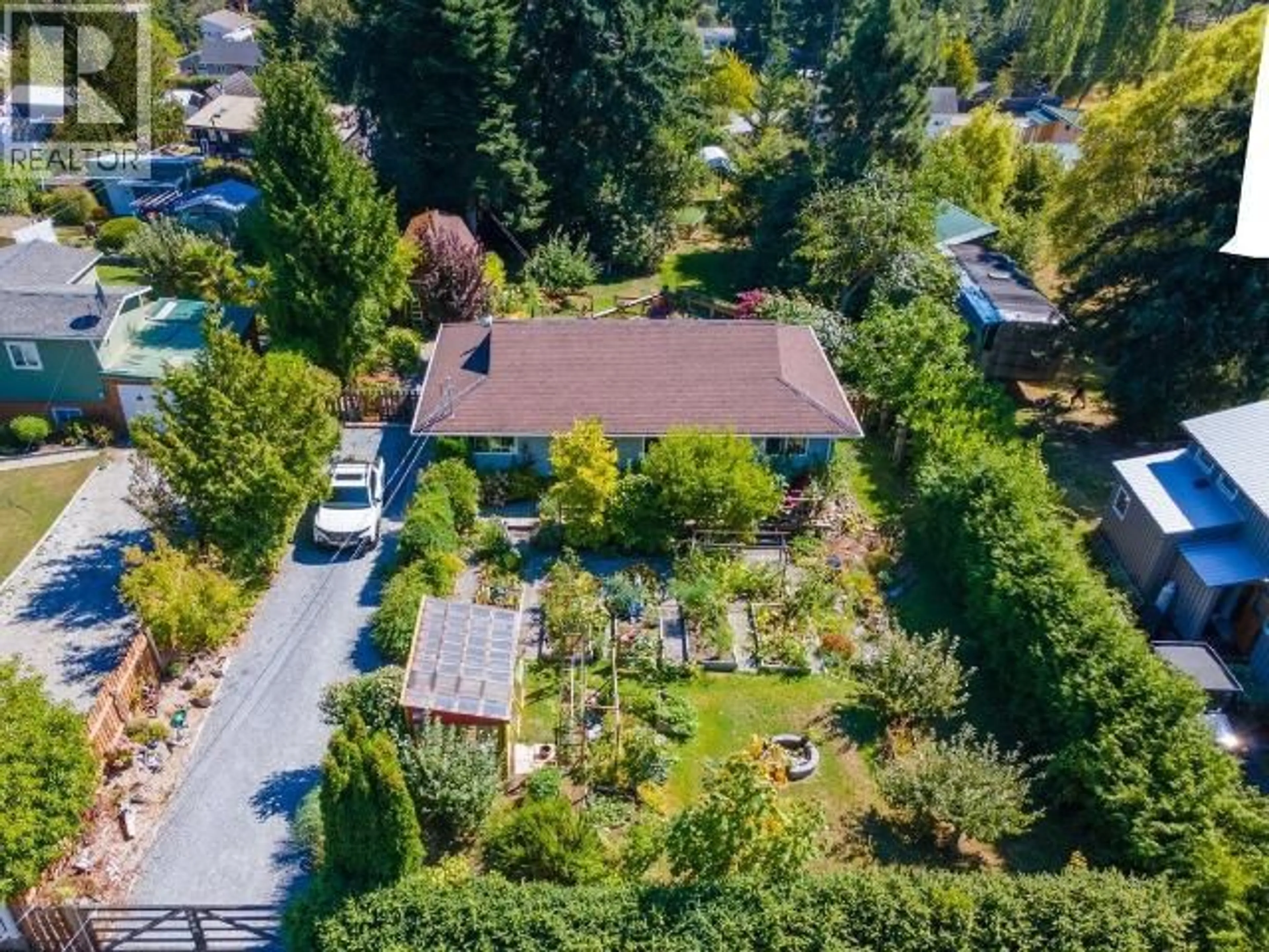 A pic from outside/outdoor area/front of a property/back of a property/a pic from drone, unknown for 4748 DOGWOOD STREET, Texada Island British Columbia