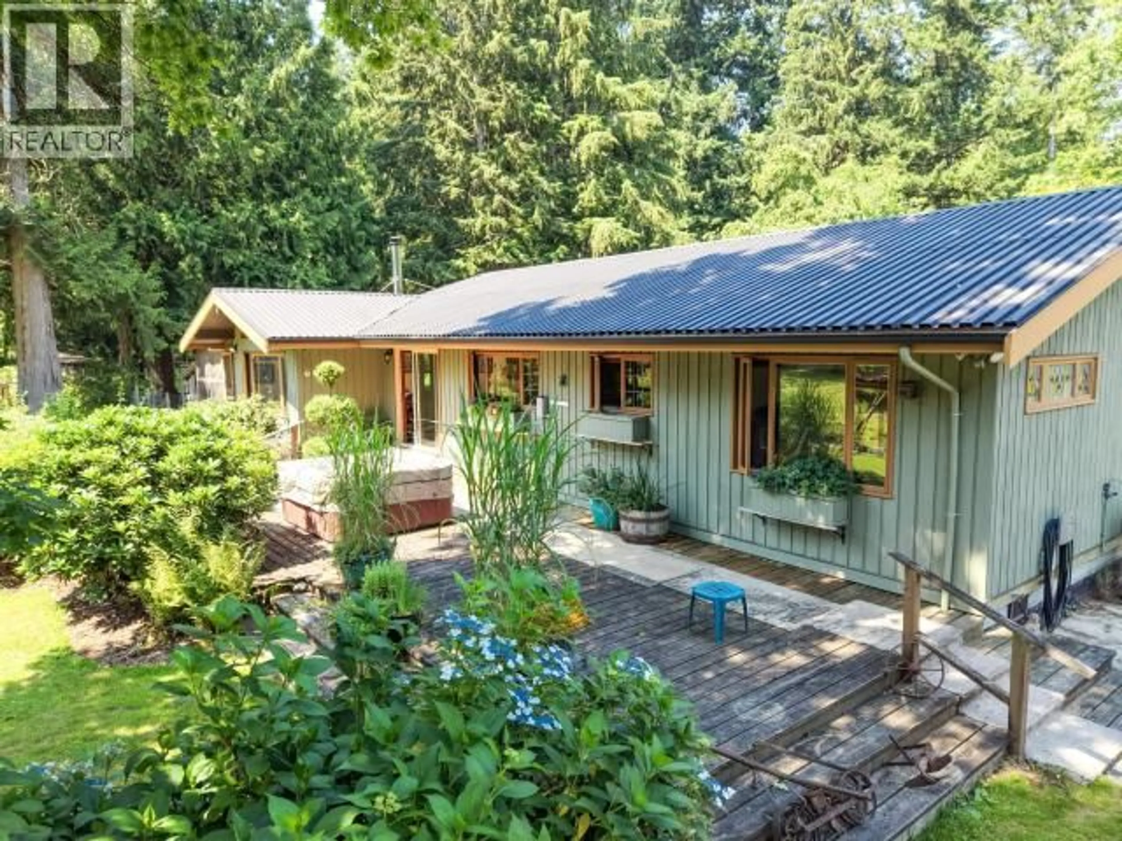 A pic from outside/outdoor area/front of a property/back of a property/a pic from drone, forest/trees view for 10440 KELLY CREEK ROAD, Powell River British Columbia V8A0P1
