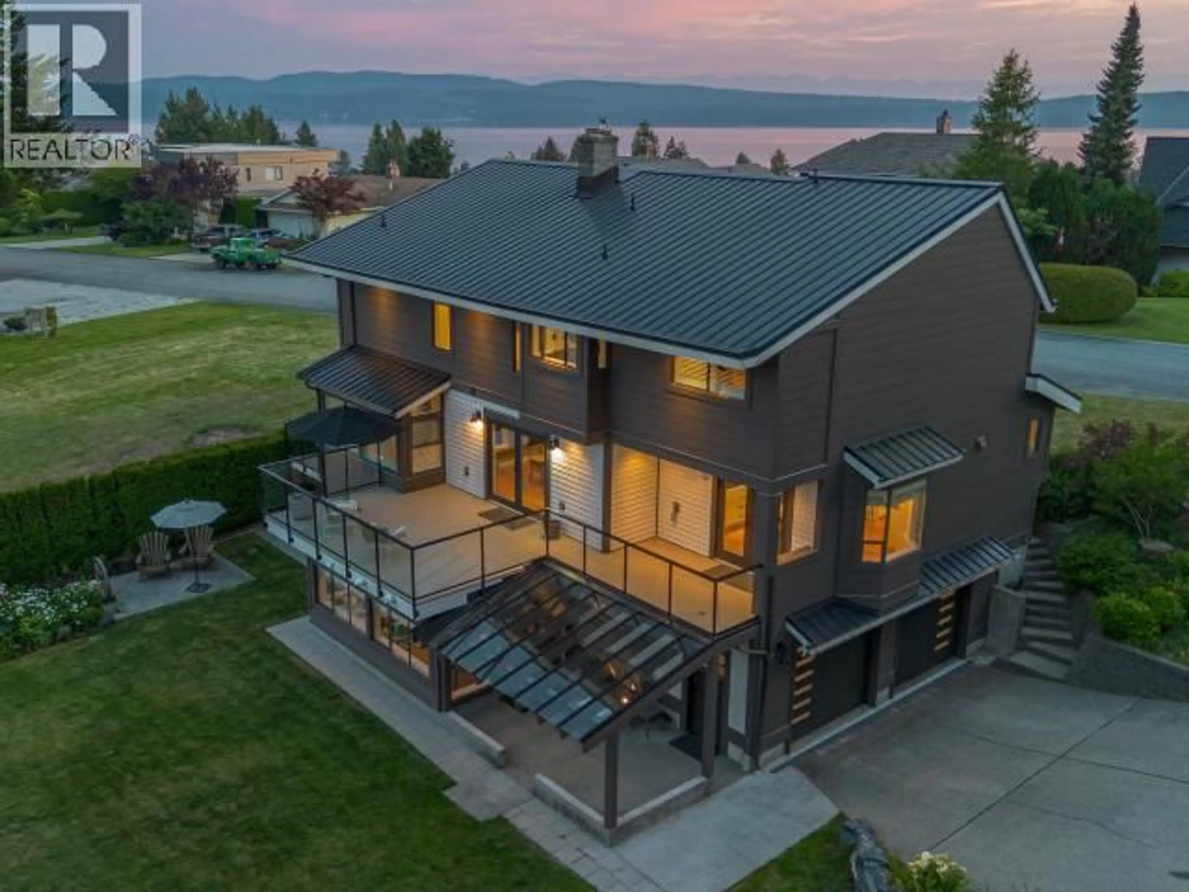 A pic from outside/outdoor area/front of a property/back of a property/a pic from drone, water/lake/river/ocean view for 3436 CARIBOO AVE, Powell River British Columbia V8A5H3