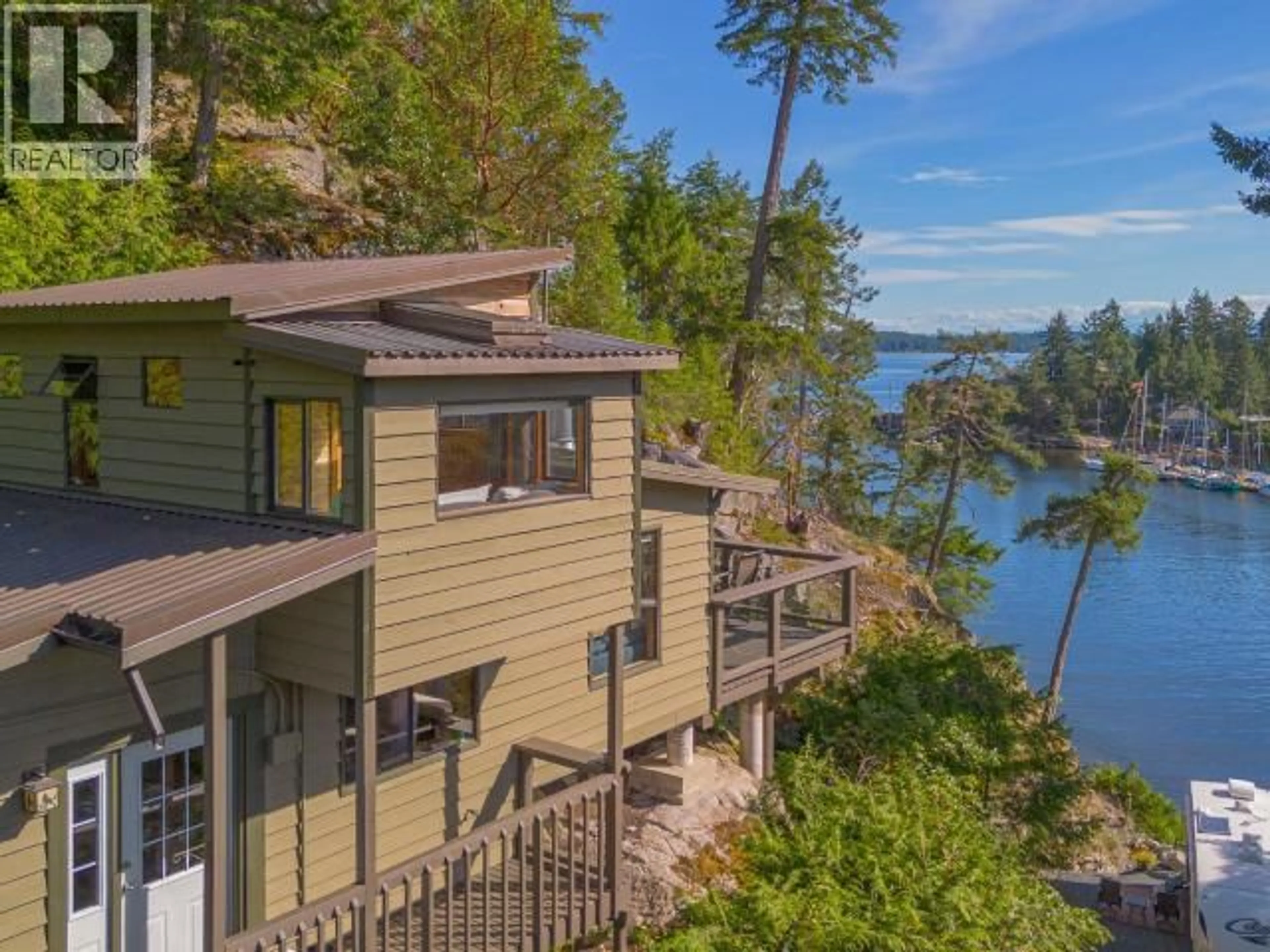 A pic from outside/outdoor area/front of a property/back of a property/a pic from drone, water/lake/river/ocean view for 9951 FINN BAY RD, Powell River British Columbia V0N2G0