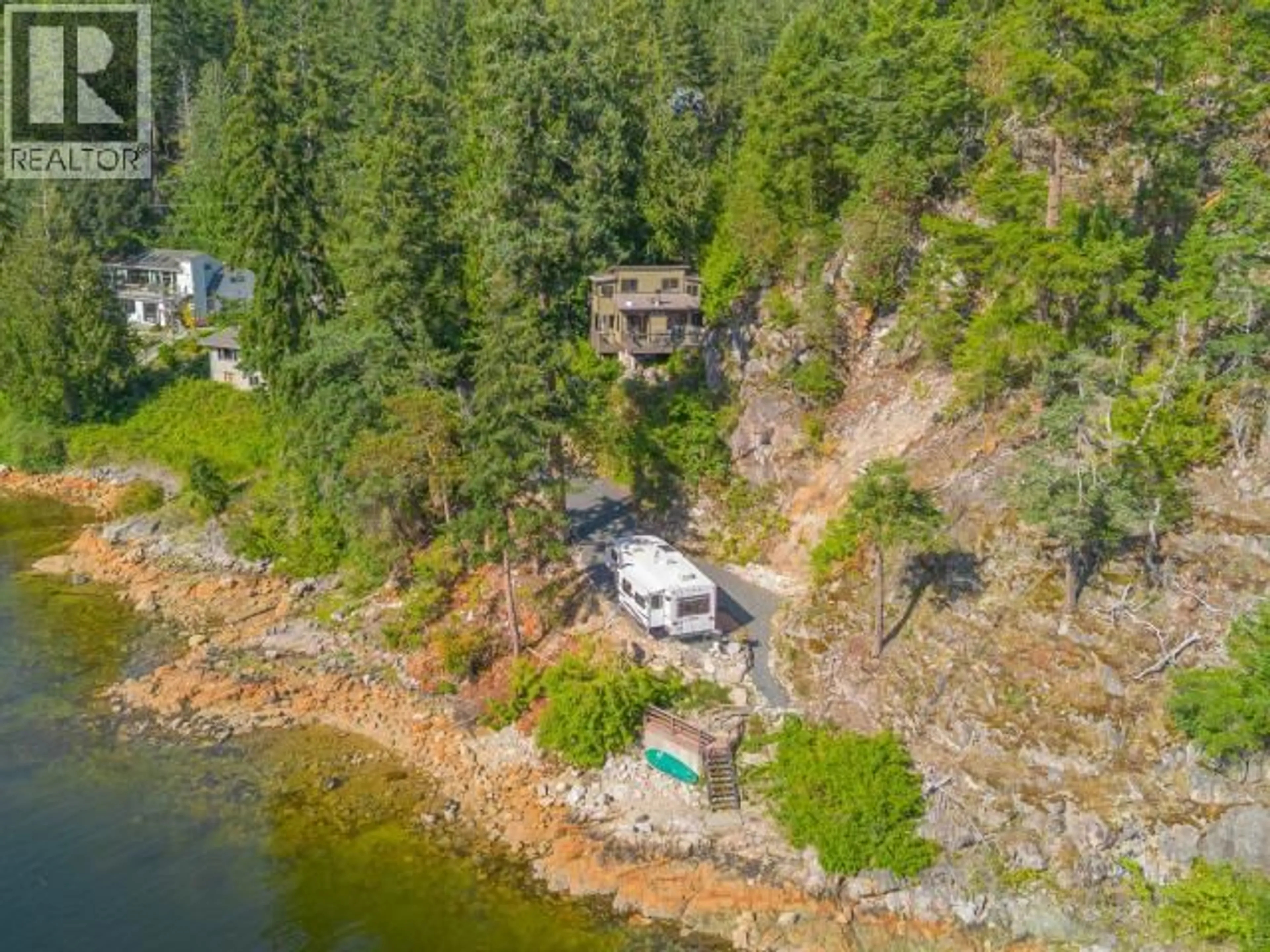 A pic from outside/outdoor area/front of a property/back of a property/a pic from drone, water/lake/river/ocean view for 9951 FINN BAY RD, Powell River British Columbia V0N2G0