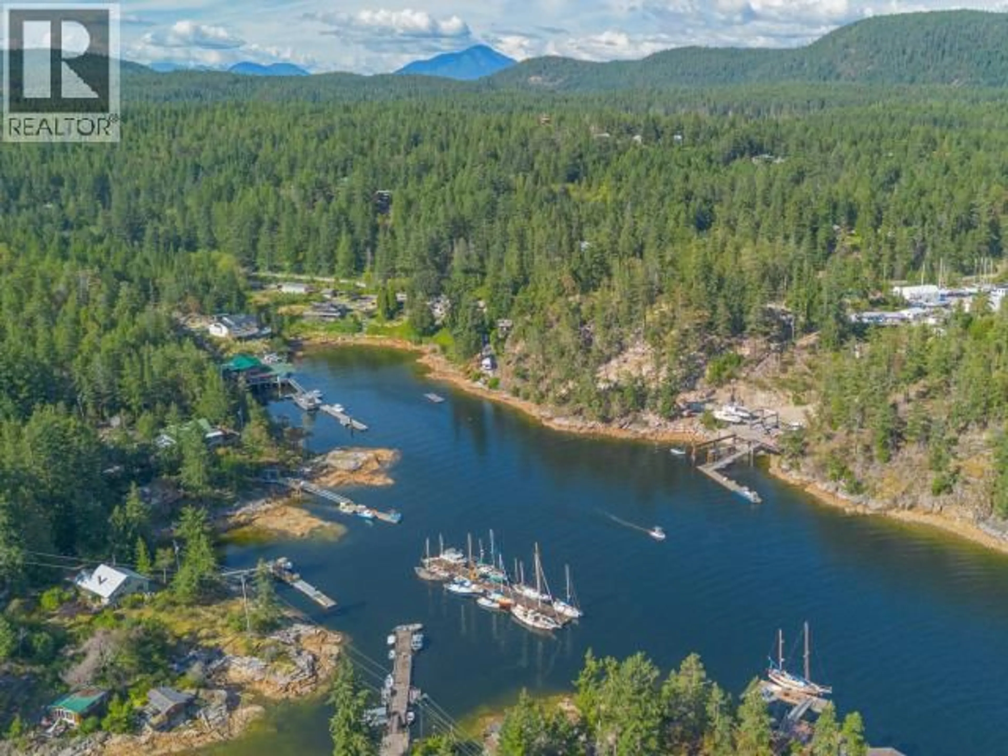 A pic from outside/outdoor area/front of a property/back of a property/a pic from drone, water/lake/river/ocean view for 9951 FINN BAY RD, Powell River British Columbia V0N2G0