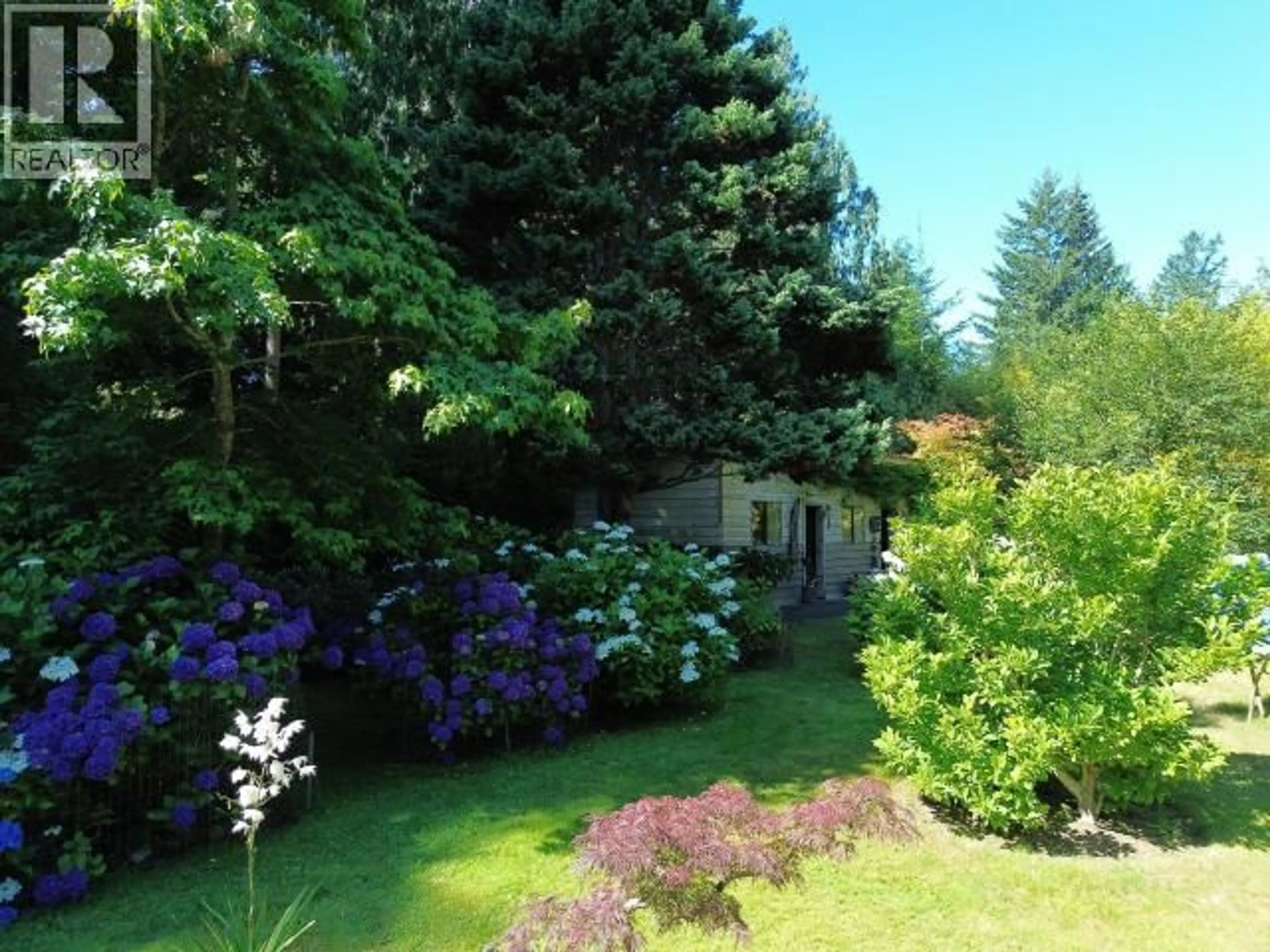 A pic from outside/outdoor area/front of a property/back of a property/a pic from drone, forest/trees view for 2241 ROBERTS ROAD, Powell River British Columbia V8A5C1