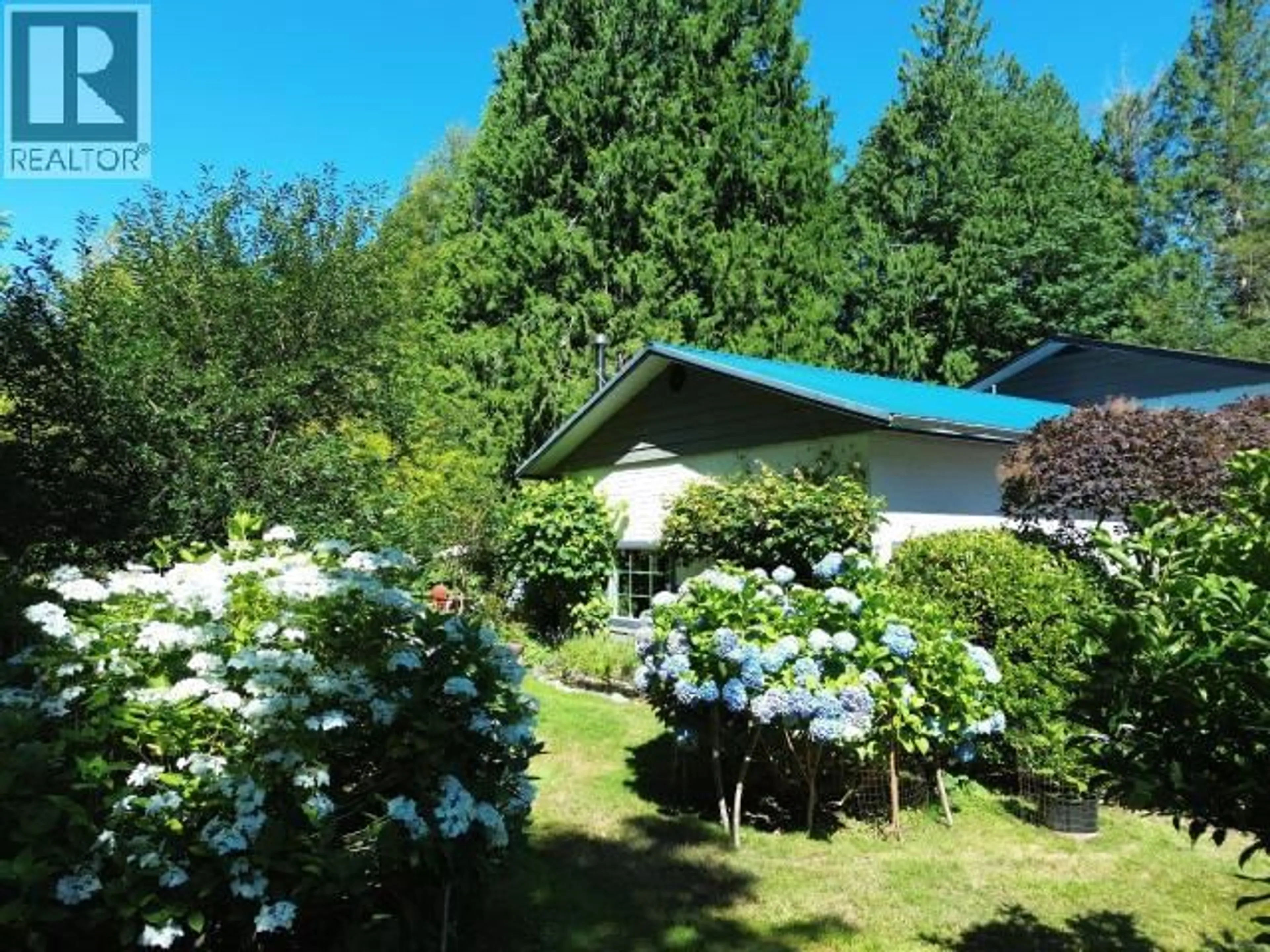 A pic from outside/outdoor area/front of a property/back of a property/a pic from drone, forest/trees view for 2241 ROBERTS ROAD, Powell River British Columbia V8A5C1
