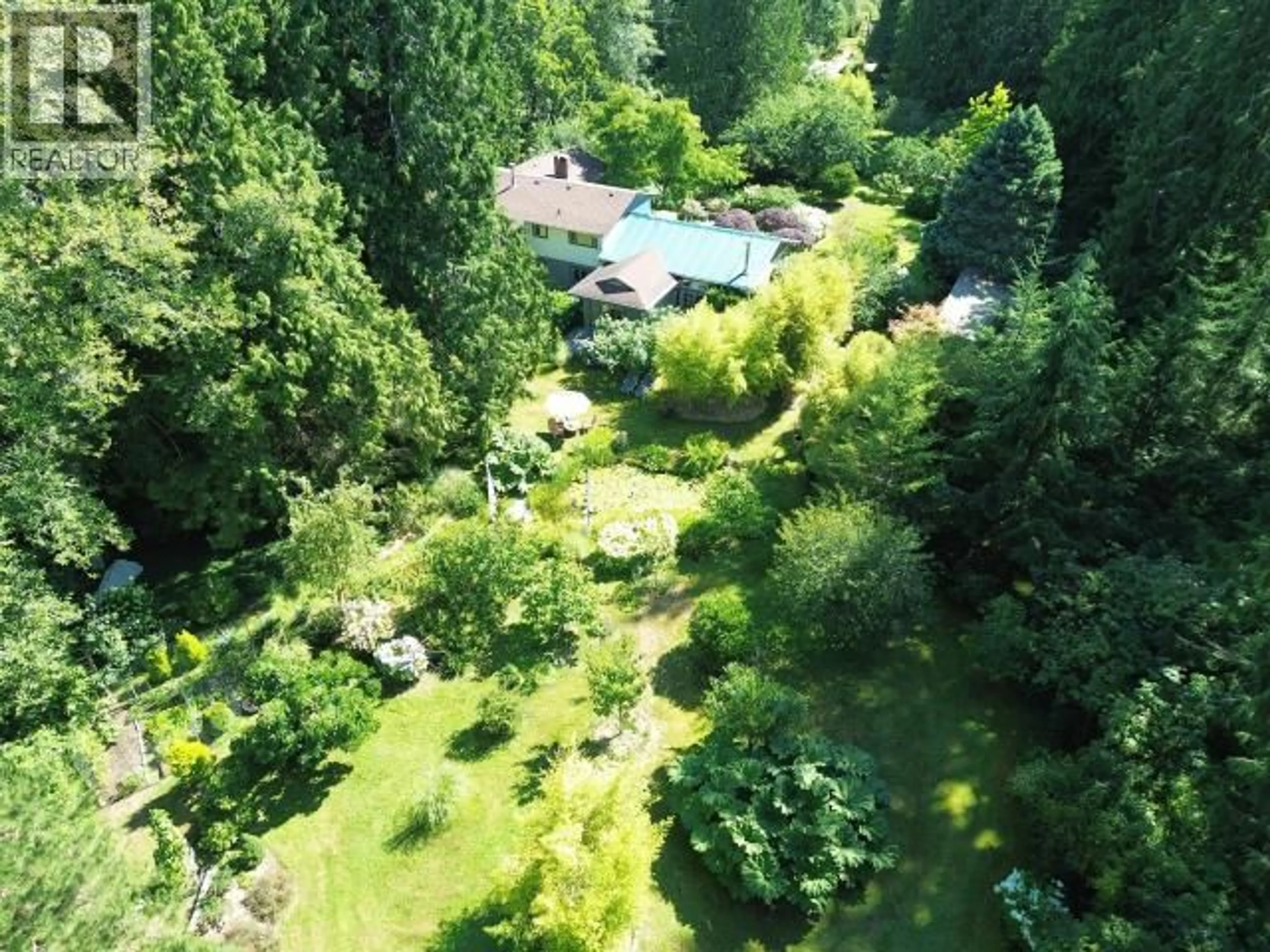 A pic from outside/outdoor area/front of a property/back of a property/a pic from drone, forest/trees view for 2241 ROBERTS ROAD, Powell River British Columbia V8A5C1