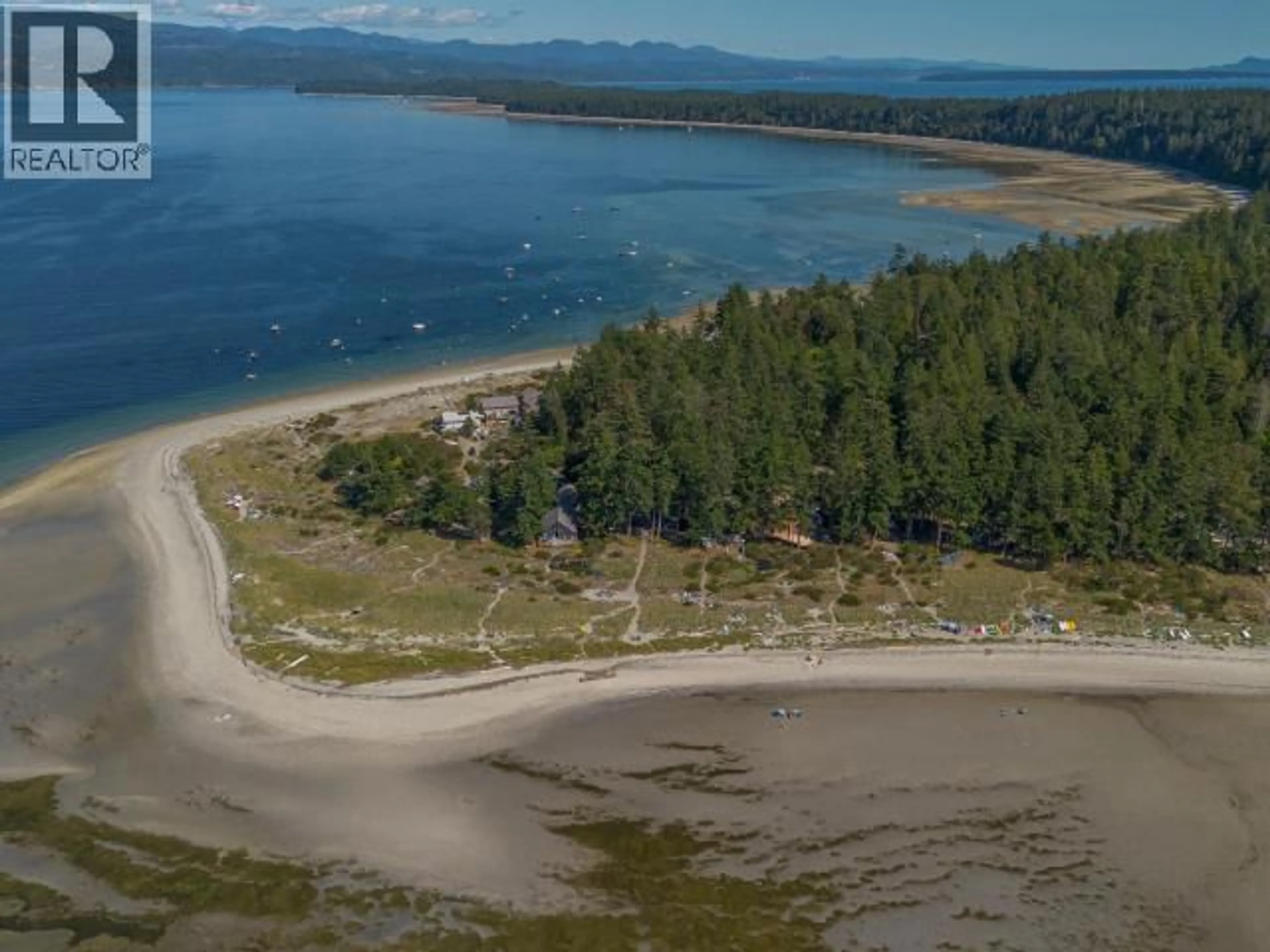 A pic from outside/outdoor area/front of a property/back of a property/a pic from drone, water/lake/river/ocean view for 920 - 16 SPILSBURY DRIVE, Savary Island British Columbia V0N2G0