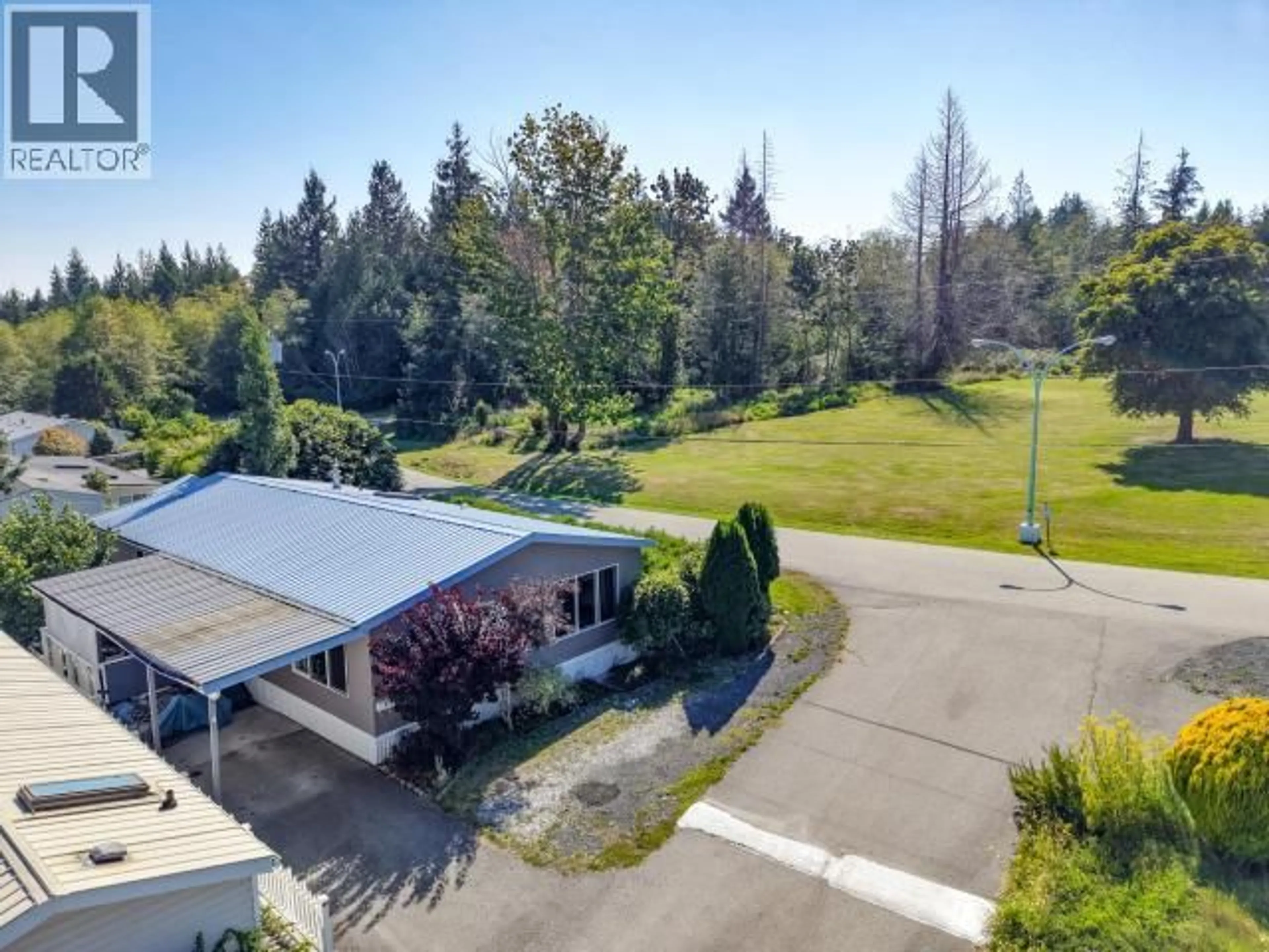 A pic from outside/outdoor area/front of a property/back of a property/a pic from drone, unknown for 6 - 7520 NOOTKA STREET, Powell River British Columbia V8A5S2