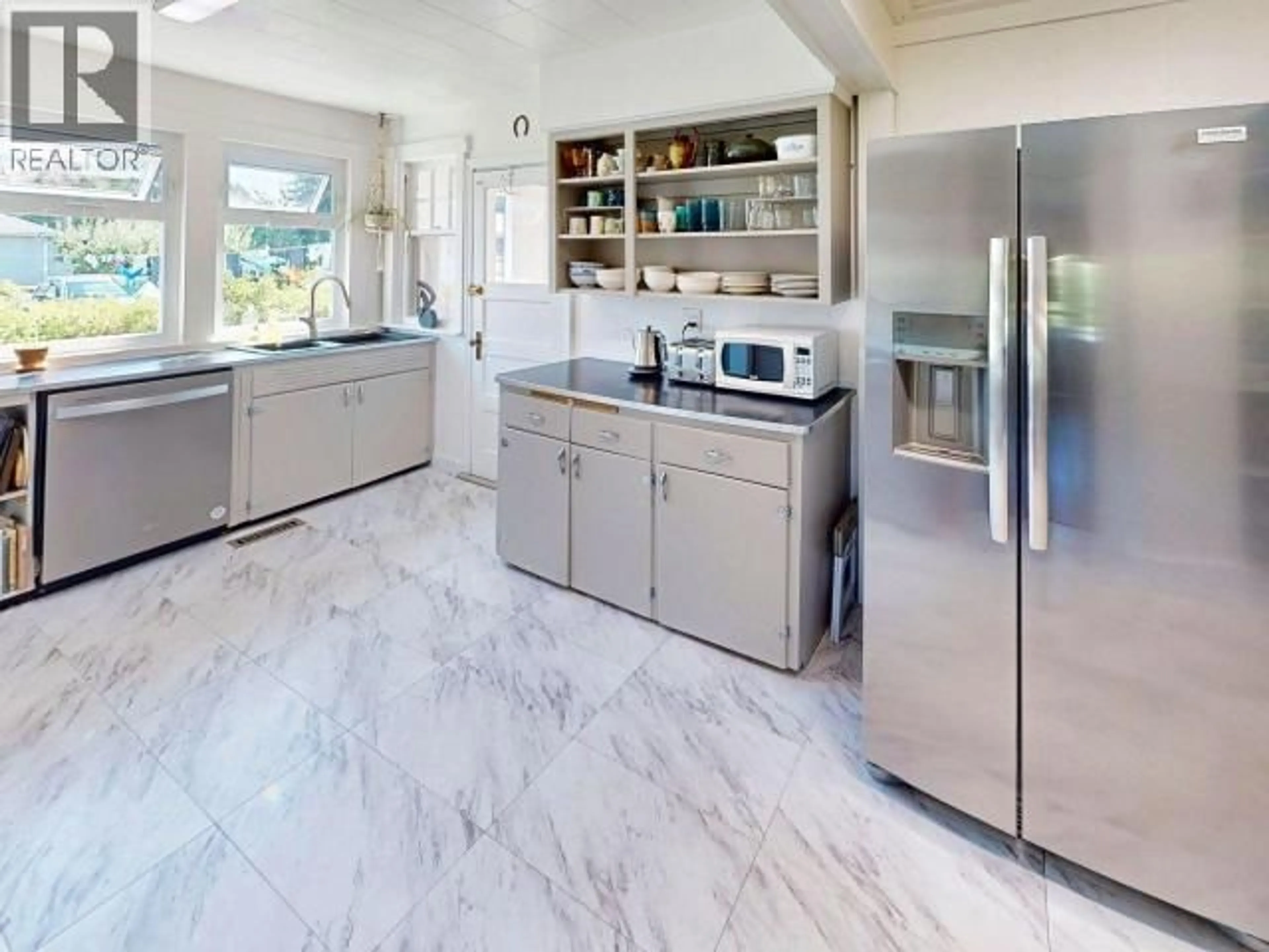 Contemporary kitchen, ceramic/tile floor for 4653 JOYCE AVE, Powell River British Columbia V8A3B5