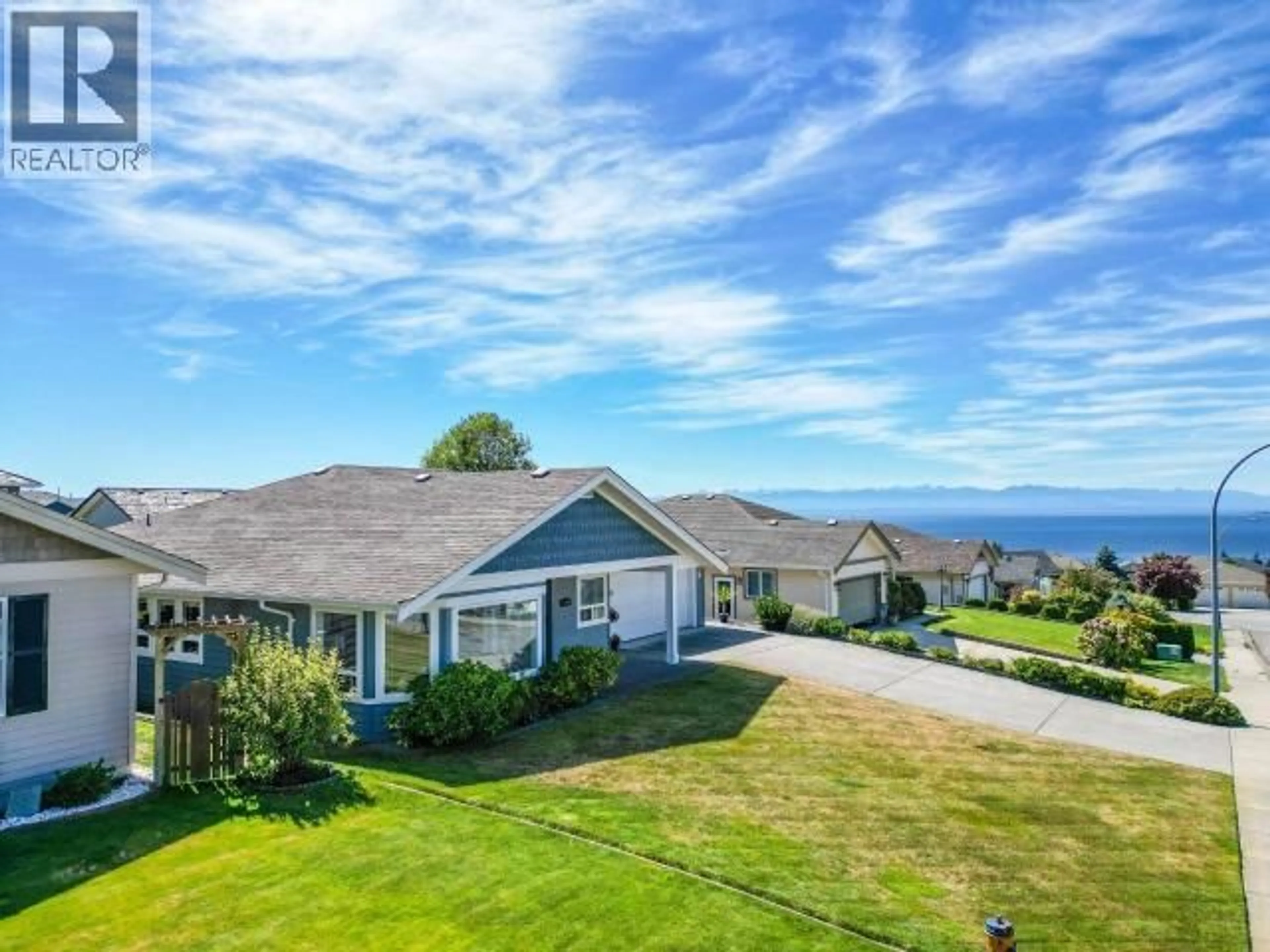 A pic from outside/outdoor area/front of a property/back of a property/a pic from drone, water/lake/river/ocean view for 7190 GEORGIA CRES, Powell River British Columbia V8A5T6