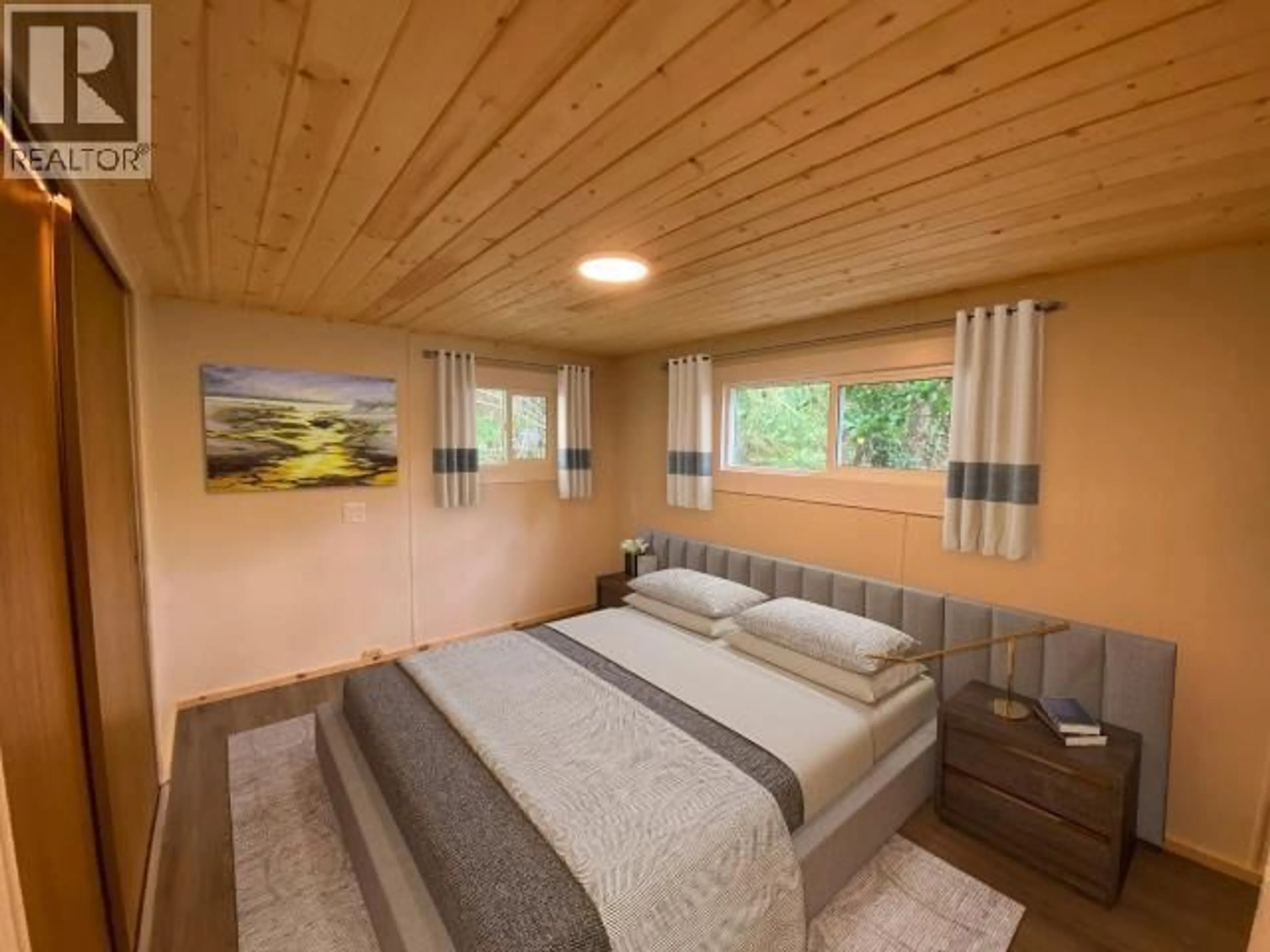 Bedroom with bed, wood/laminate floor for 27 - 6263 LUND, Powell River British Columbia V8A4T3