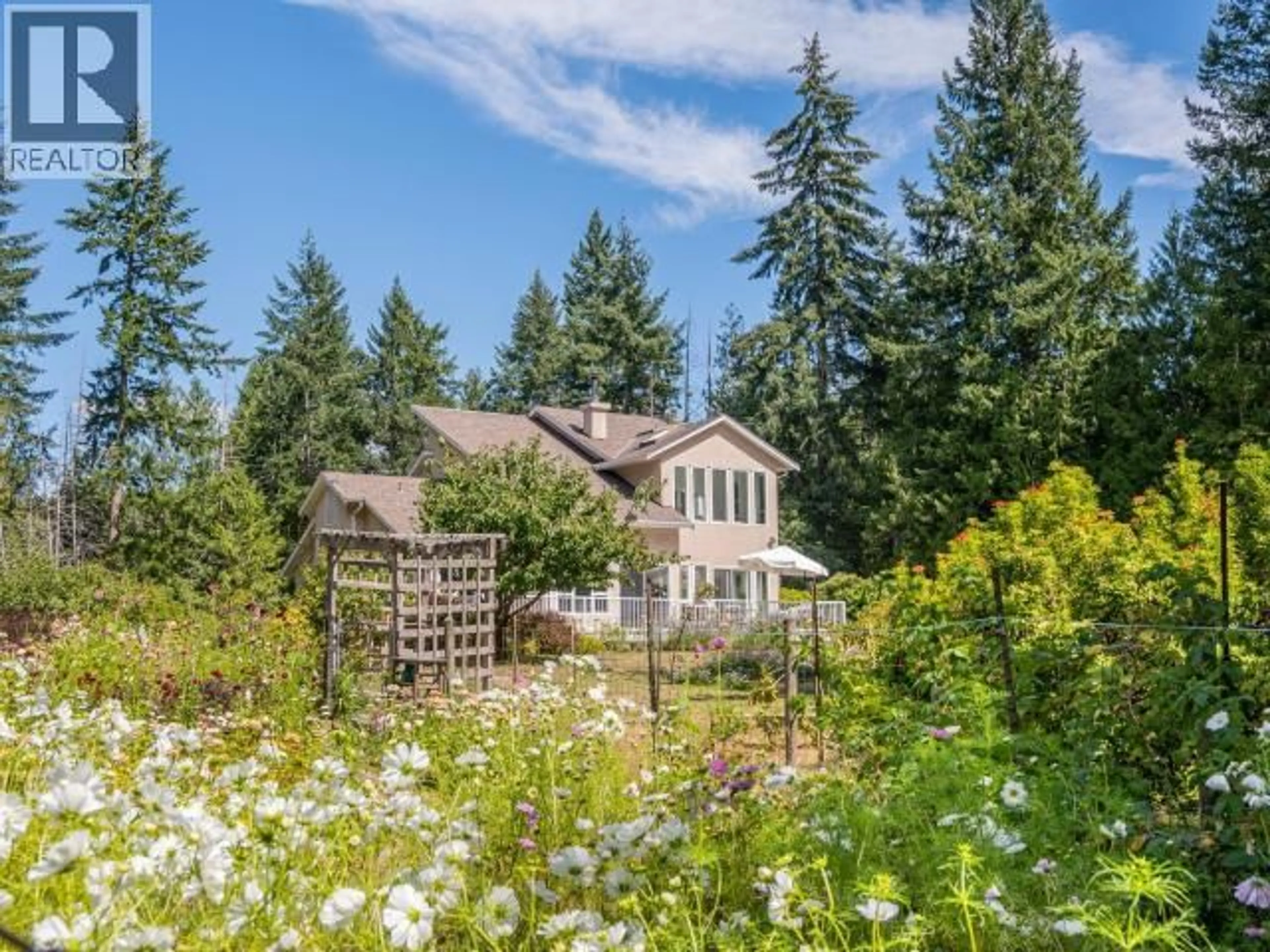 A pic from outside/outdoor area/front of a property/back of a property/a pic from drone, forest/trees view for 9350 MALASPINA RD, Powell River British Columbia V8A0G2