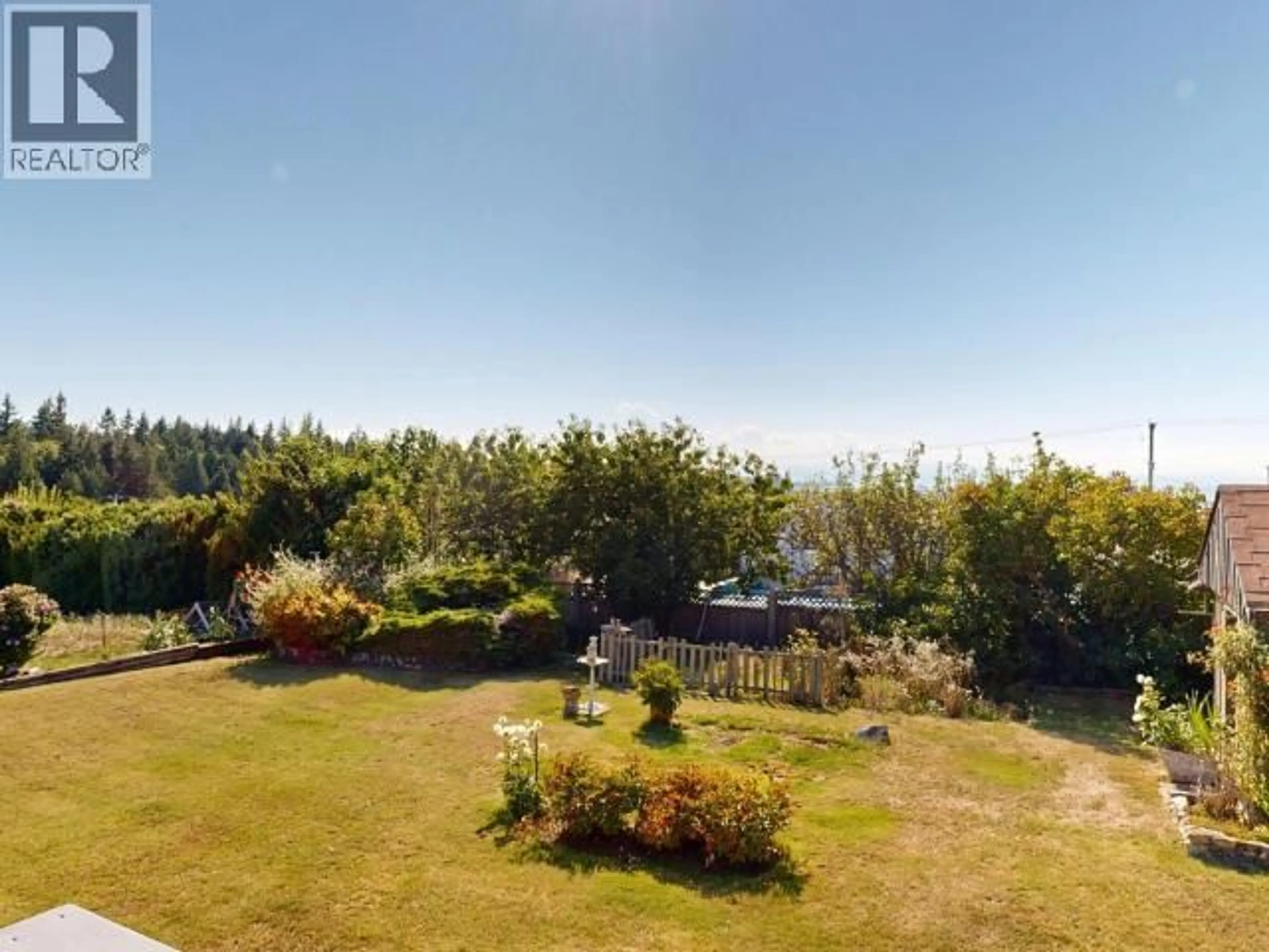 A pic from outside/outdoor area/front of a property/back of a property/a pic from drone, forest/trees view for 3763 SELKIRK AVE, Powell River British Columbia V8A3C2