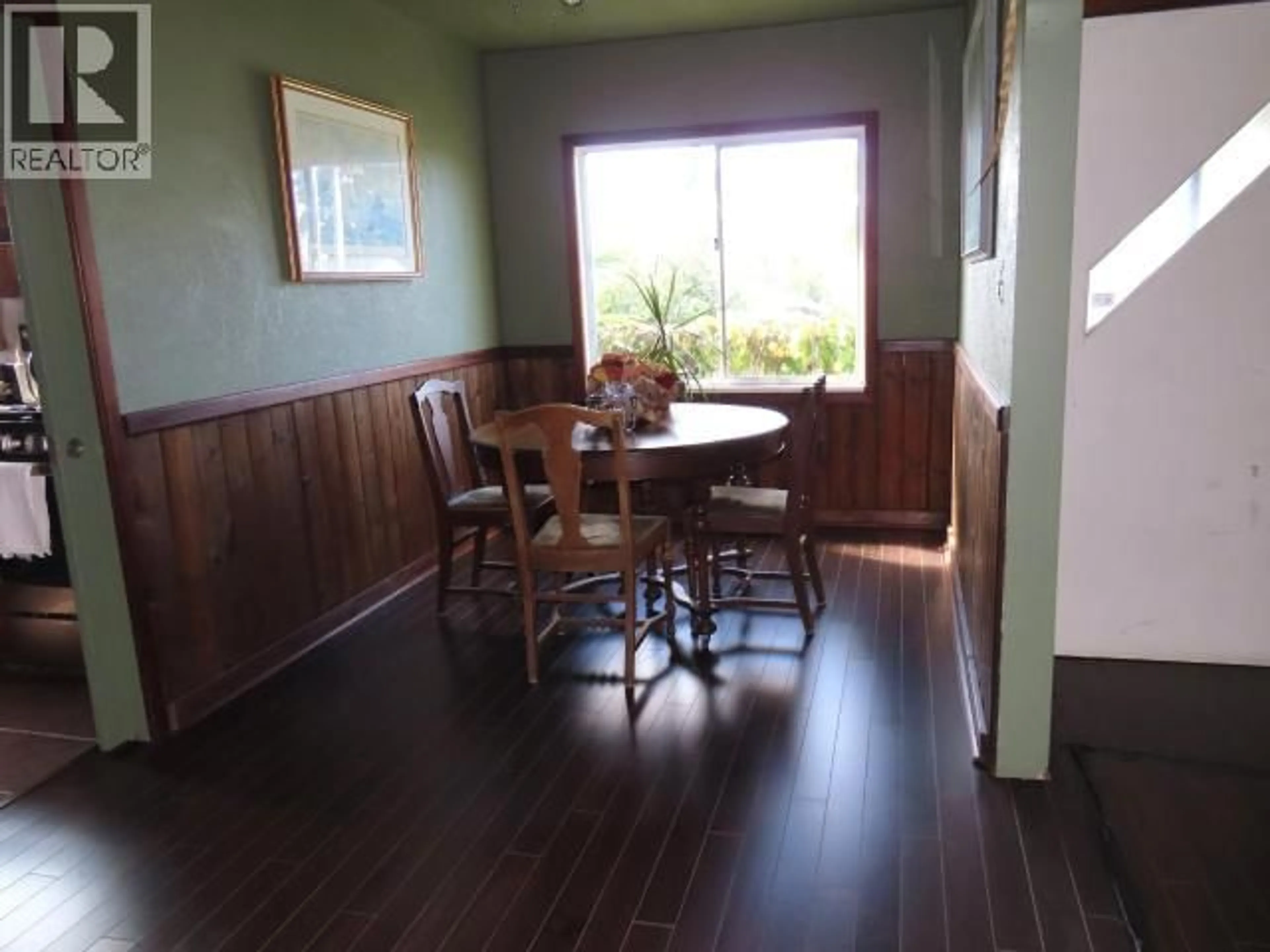 Dining room, wood/laminate floor for 4538 MICHIGAN AVE, Powell River British Columbia V8A2S7