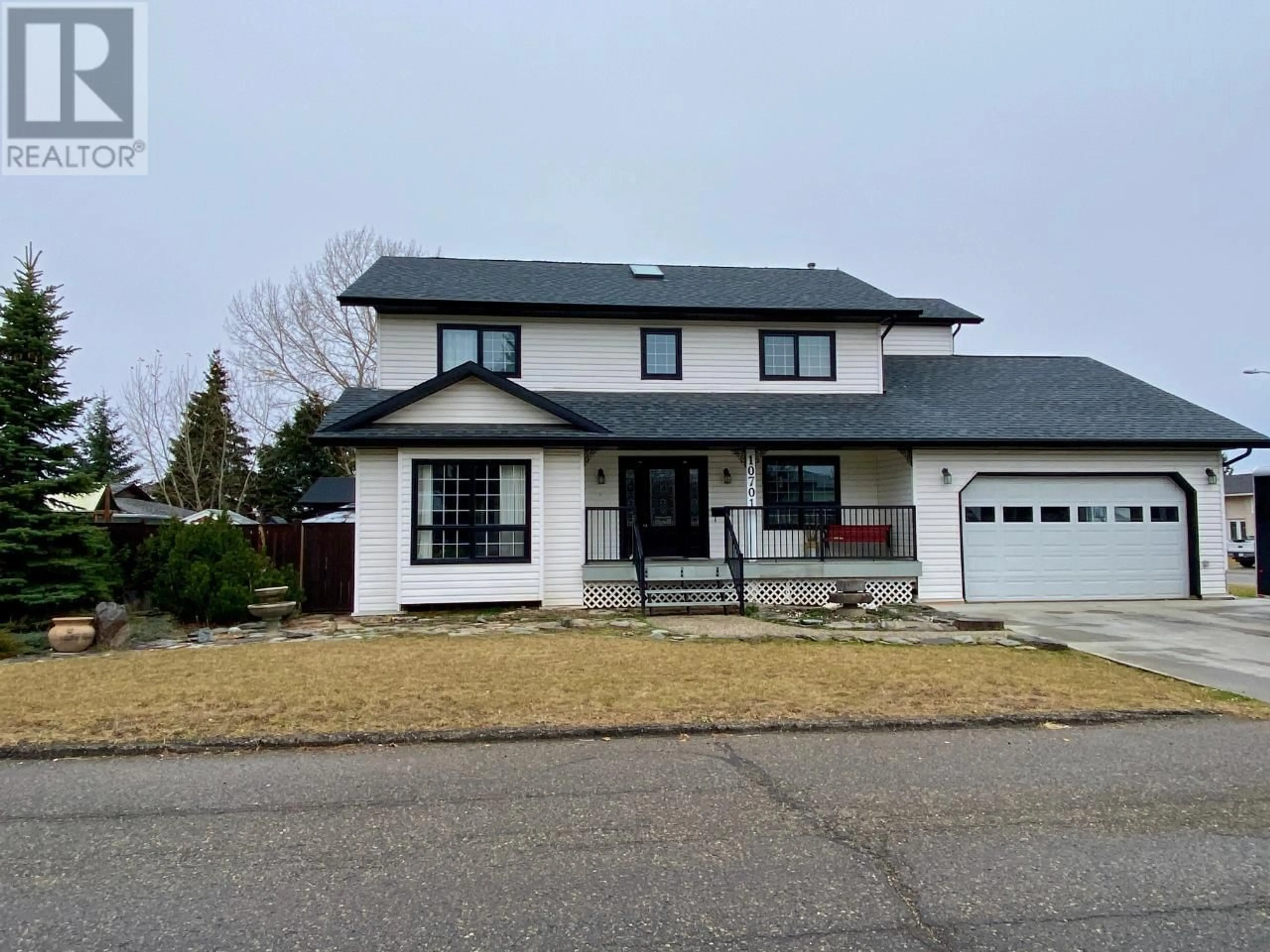 Frontside or backside of a home, the street view for 10701 CYPRUS Court, Dawson Creek British Columbia V1G4N1