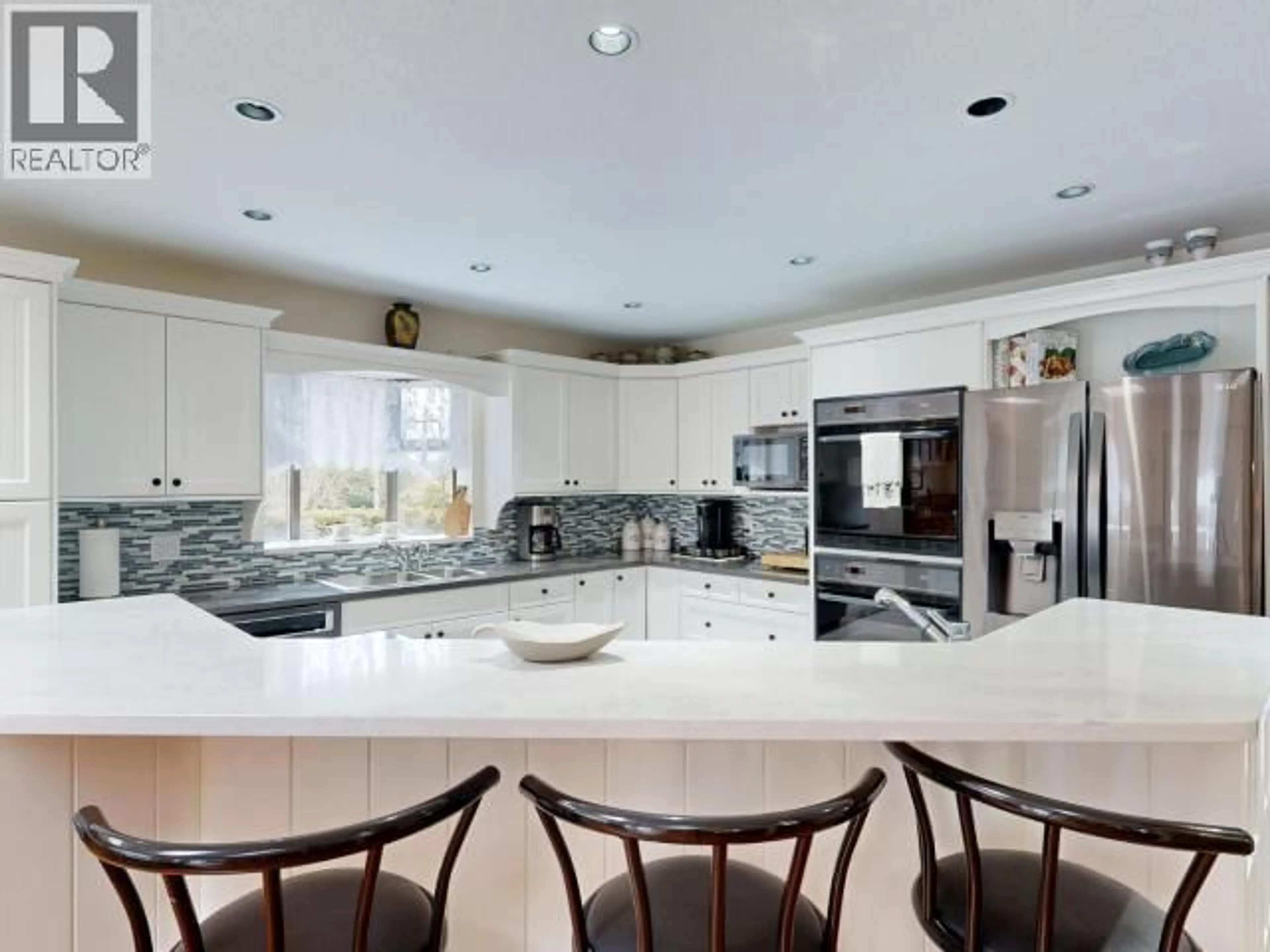 Contemporary kitchen, ceramic/tile floor for 3700 MACKENZIE AVE, Powell River British Columbia V8A3E8