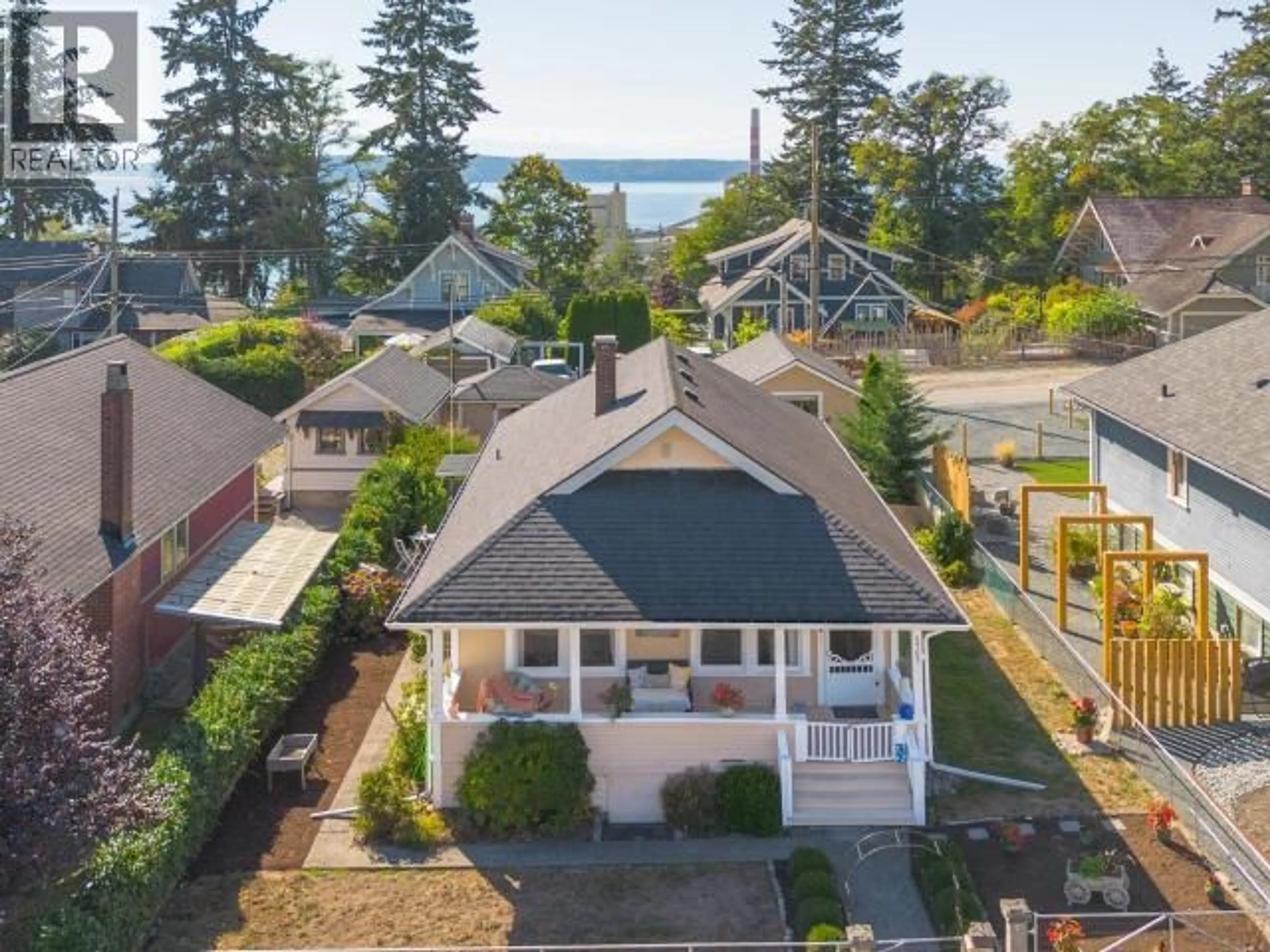 A pic from outside/outdoor area/front of a property/back of a property/a pic from drone, water/lake/river/ocean view for 5767 MAPLE AVE, Powell River British Columbia V8A4P1