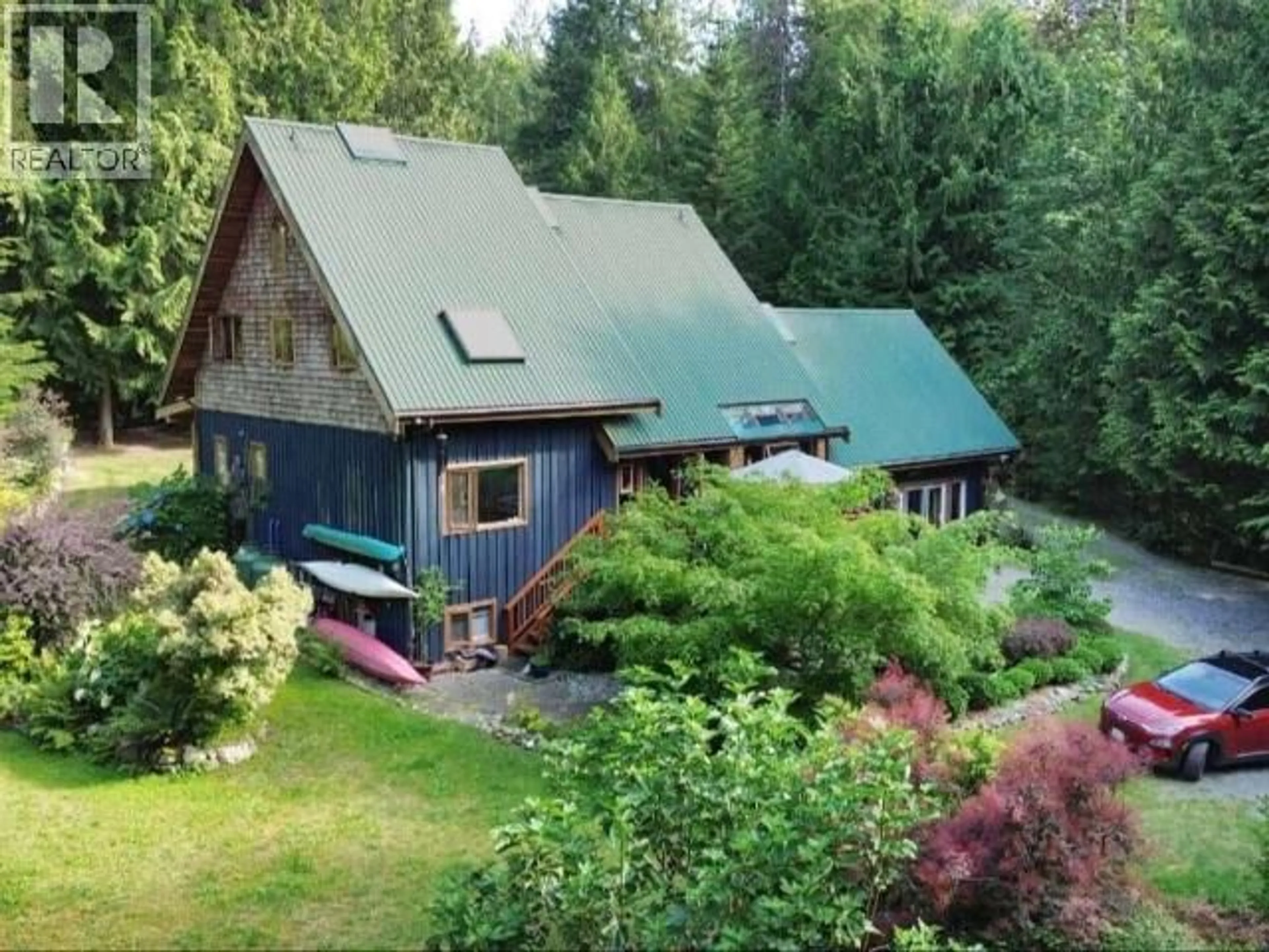 A pic from outside/outdoor area/front of a property/back of a property/a pic from drone, mountain view for 9340 MALASPINA RD, Powell River British Columbia V8A0G2