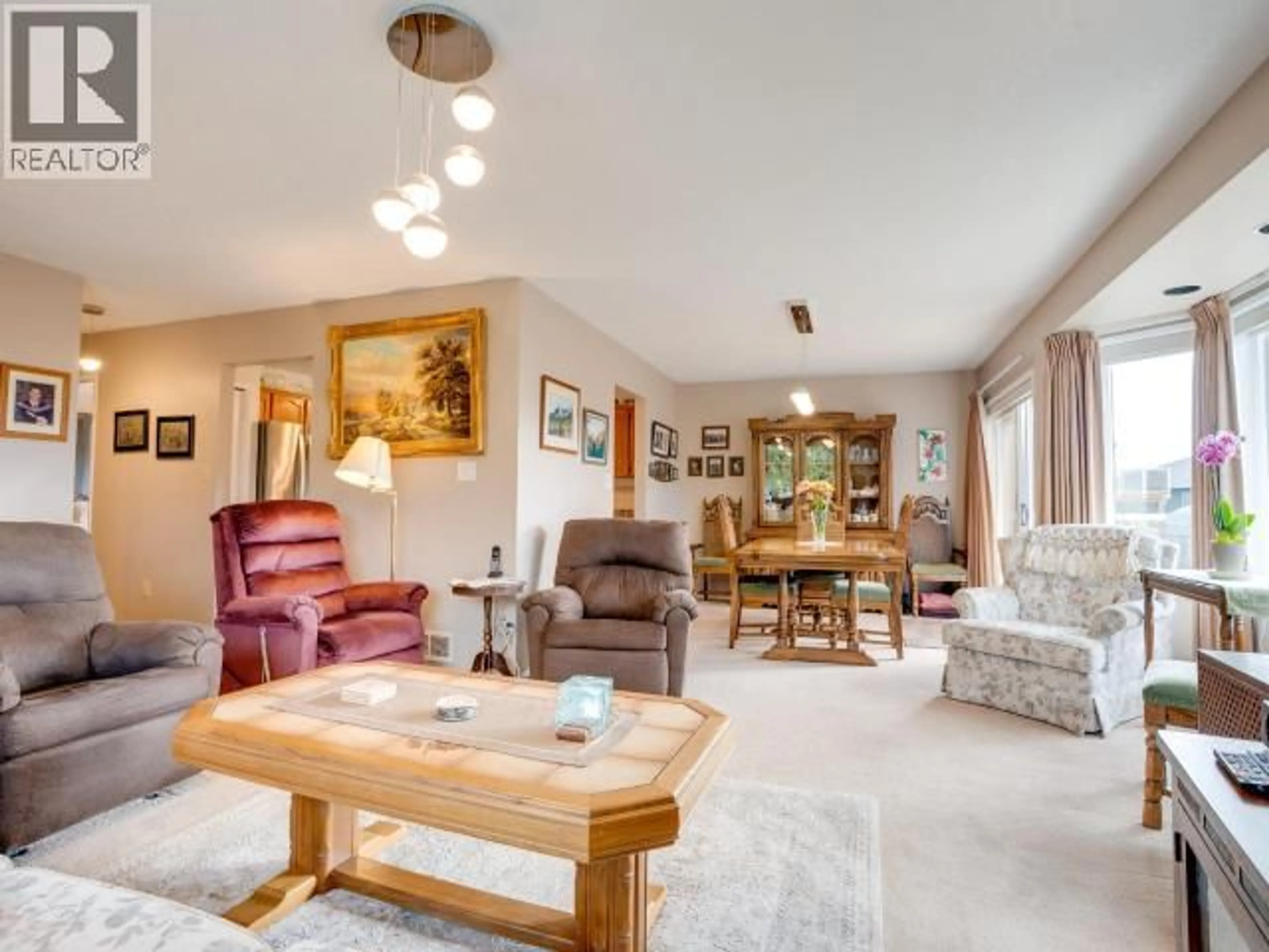 Living room with furniture, unknown for 6886 HARVIE AVE, Powell River British Columbia V8A5J1