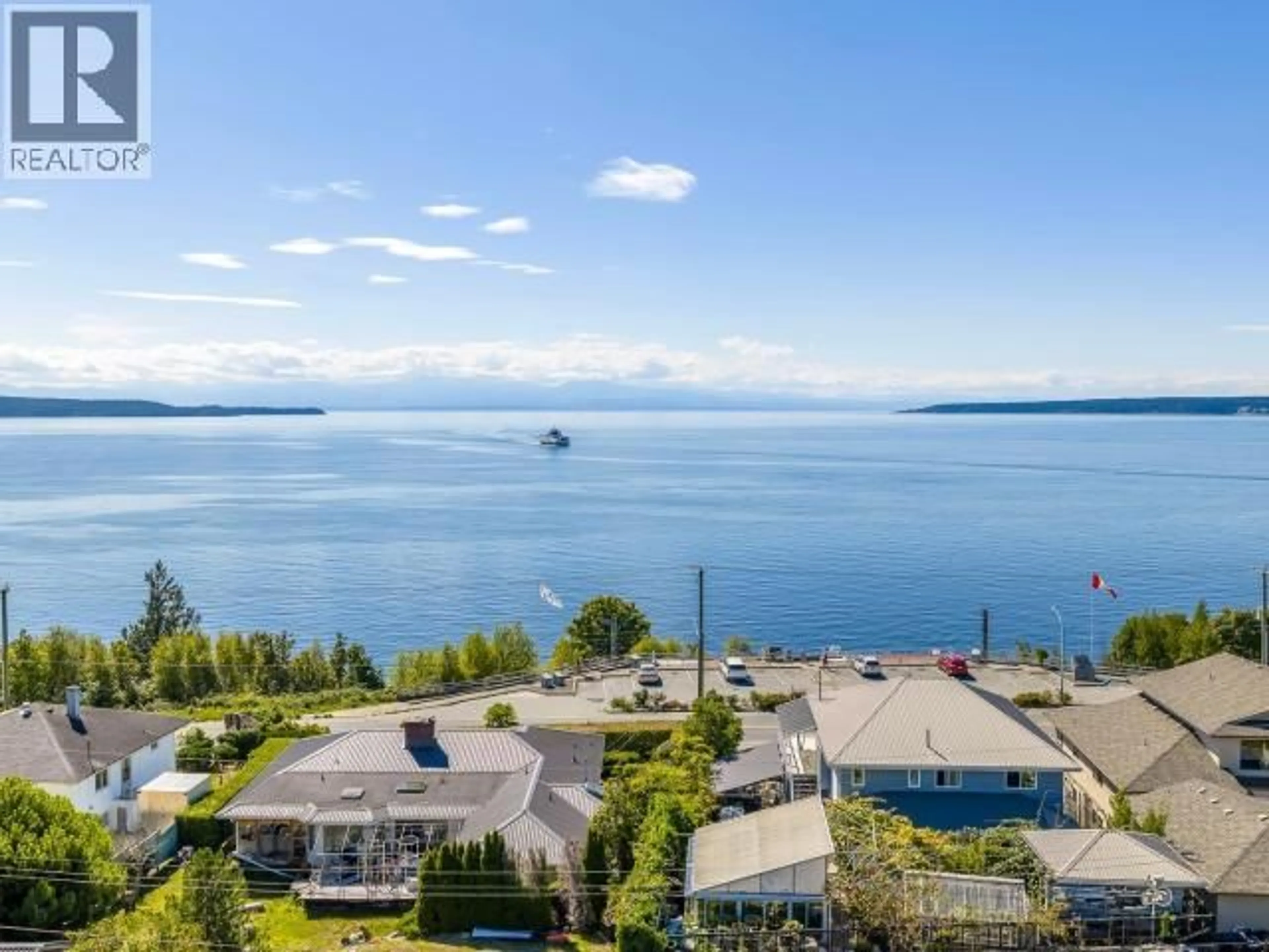 A pic from outside/outdoor area/front of a property/back of a property/a pic from drone, water/lake/river/ocean view for 4109 WHALEN AVE, Powell River British Columbia V8A2R8