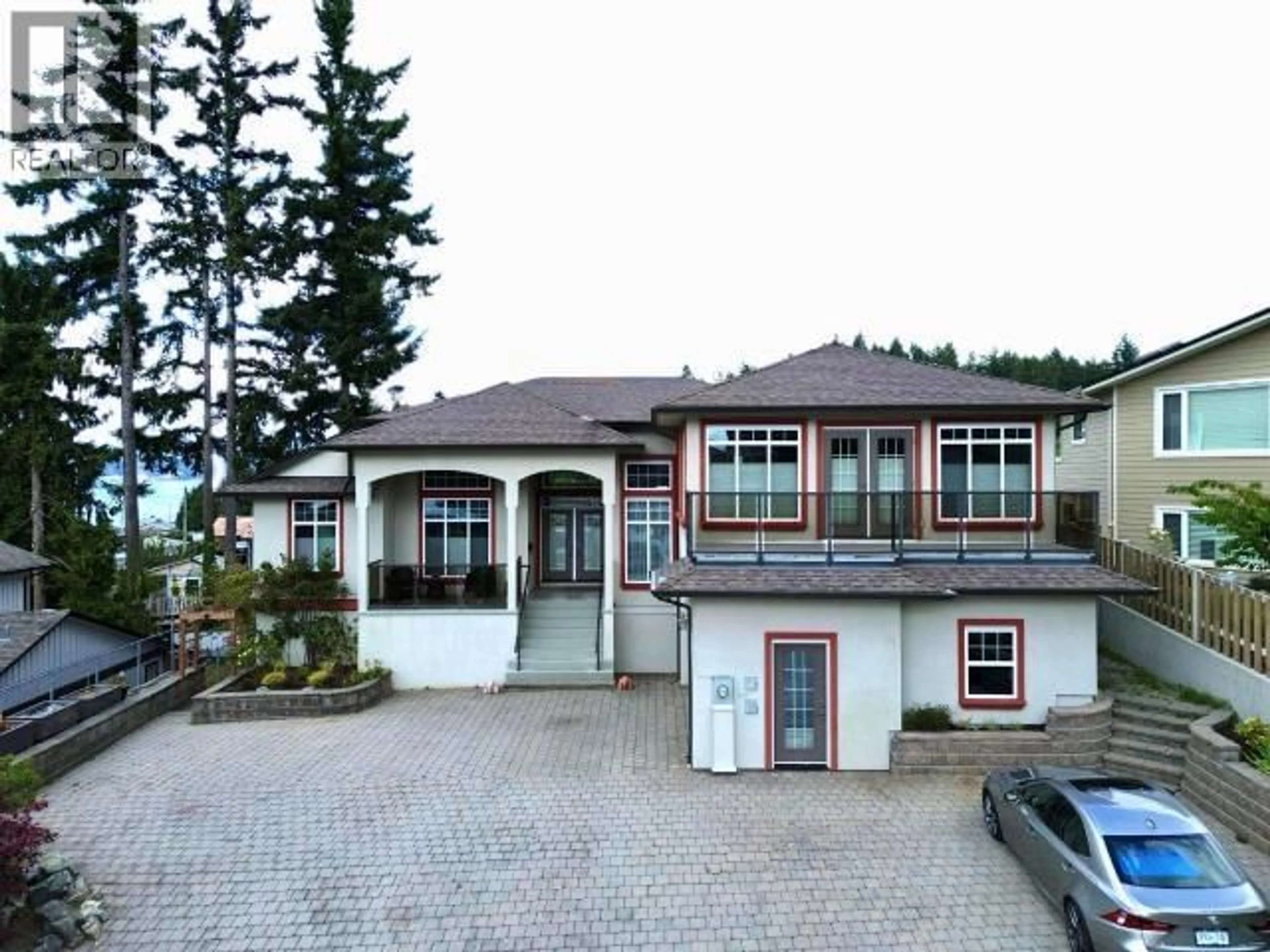 Home with vinyl exterior material, street for 6929 RETASKIT CRT, Powell River British Columbia V8A5T2