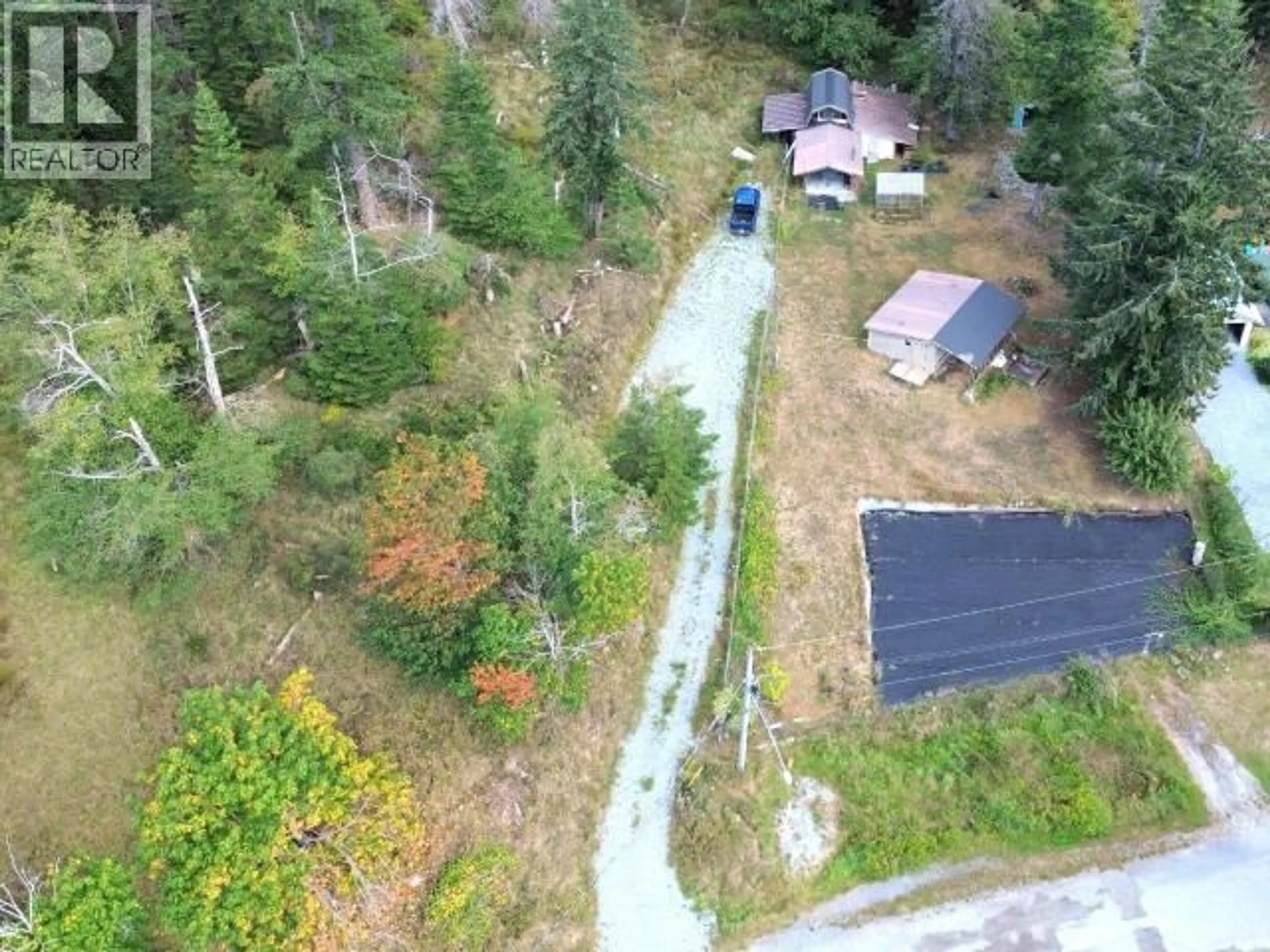 A pic from outside/outdoor area/front of a property/back of a property/a pic from drone, forest/trees view for 4317 SANDERSON ROAD, Texada Island British Columbia V0N1W0