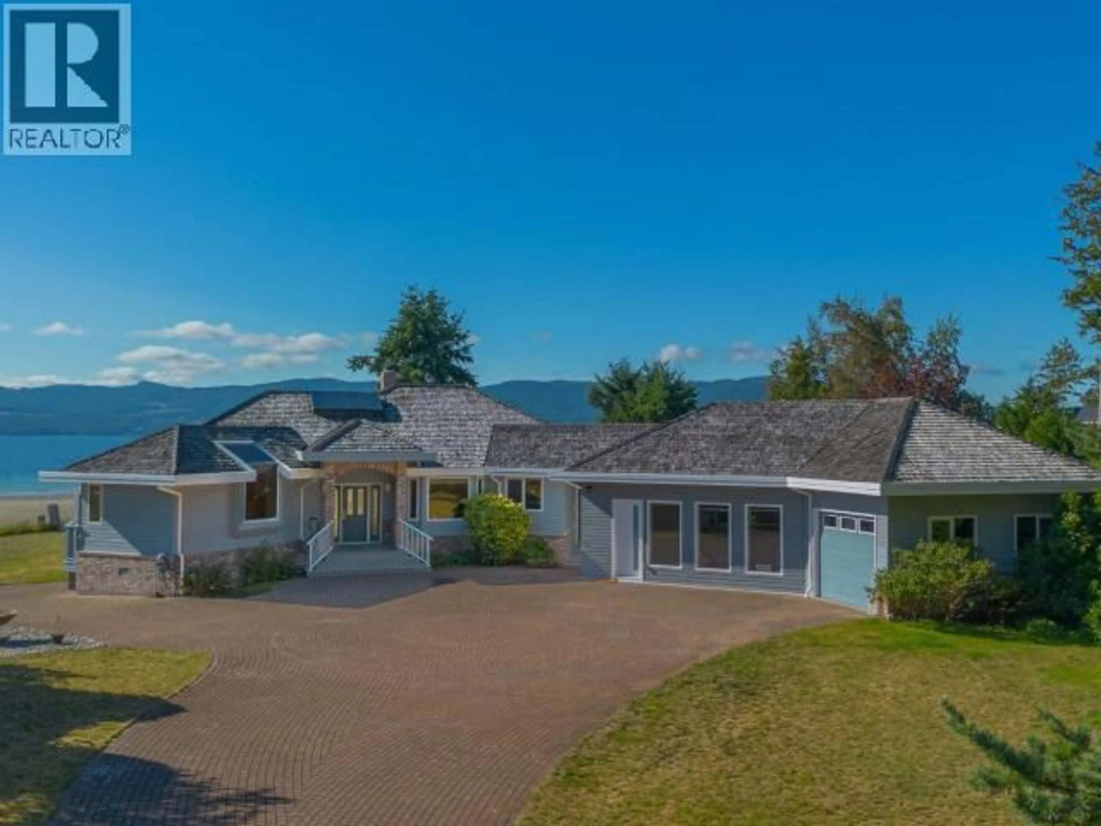 A pic from outside/outdoor area/front of a property/back of a property/a pic from drone, water/lake/river/ocean view for 10219 DOUGLAS BAY ROAD, Powell River British Columbia V8A0K7