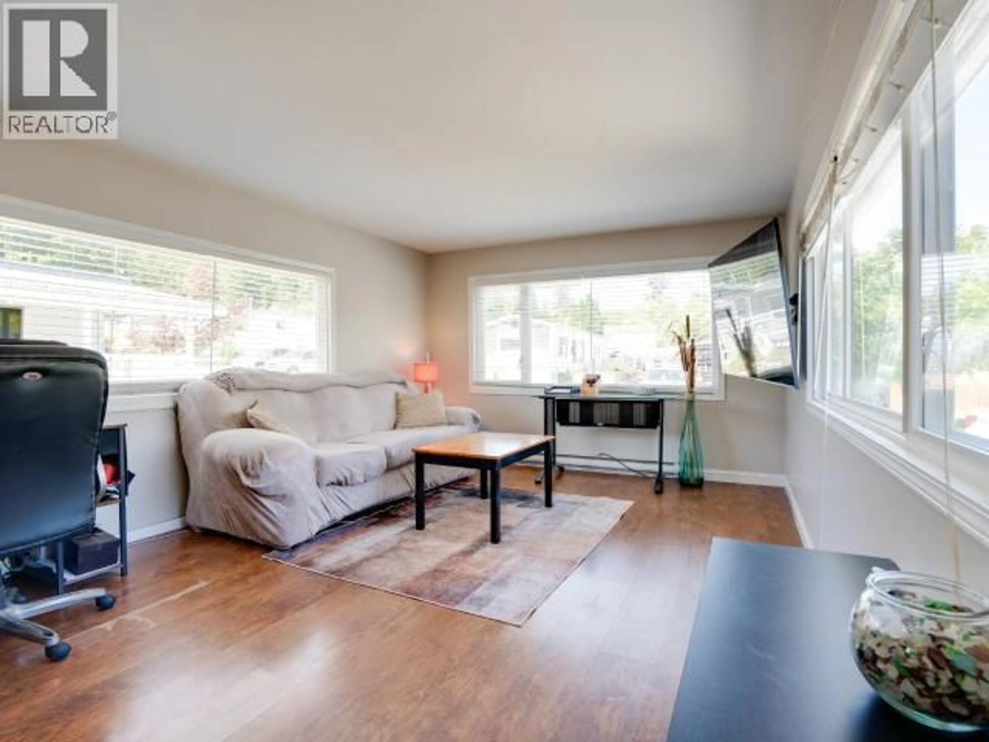 Living room with furniture, wood/laminate floor for 45-4500 CLARIDGE ROAD, Powell River British Columbia V8A5N2