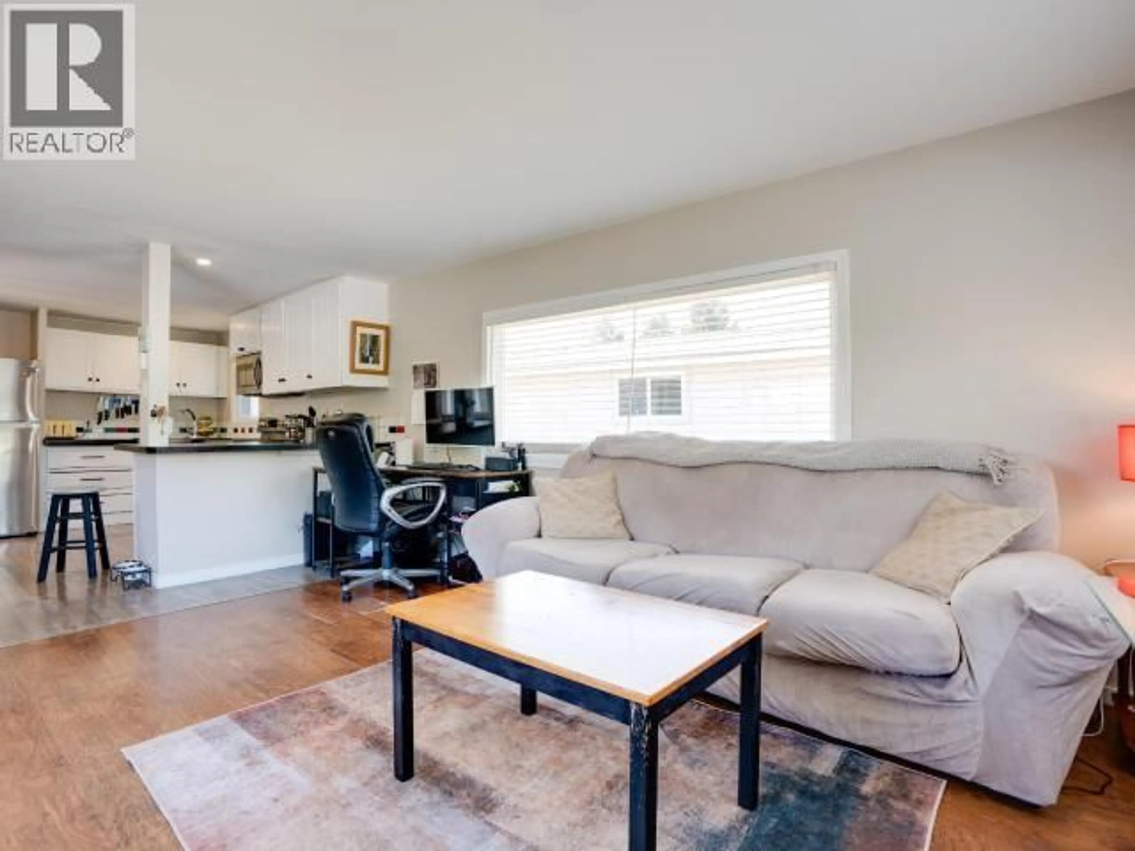Living room with furniture, wood/laminate floor for 45-4500 CLARIDGE ROAD, Powell River British Columbia V8A5N2