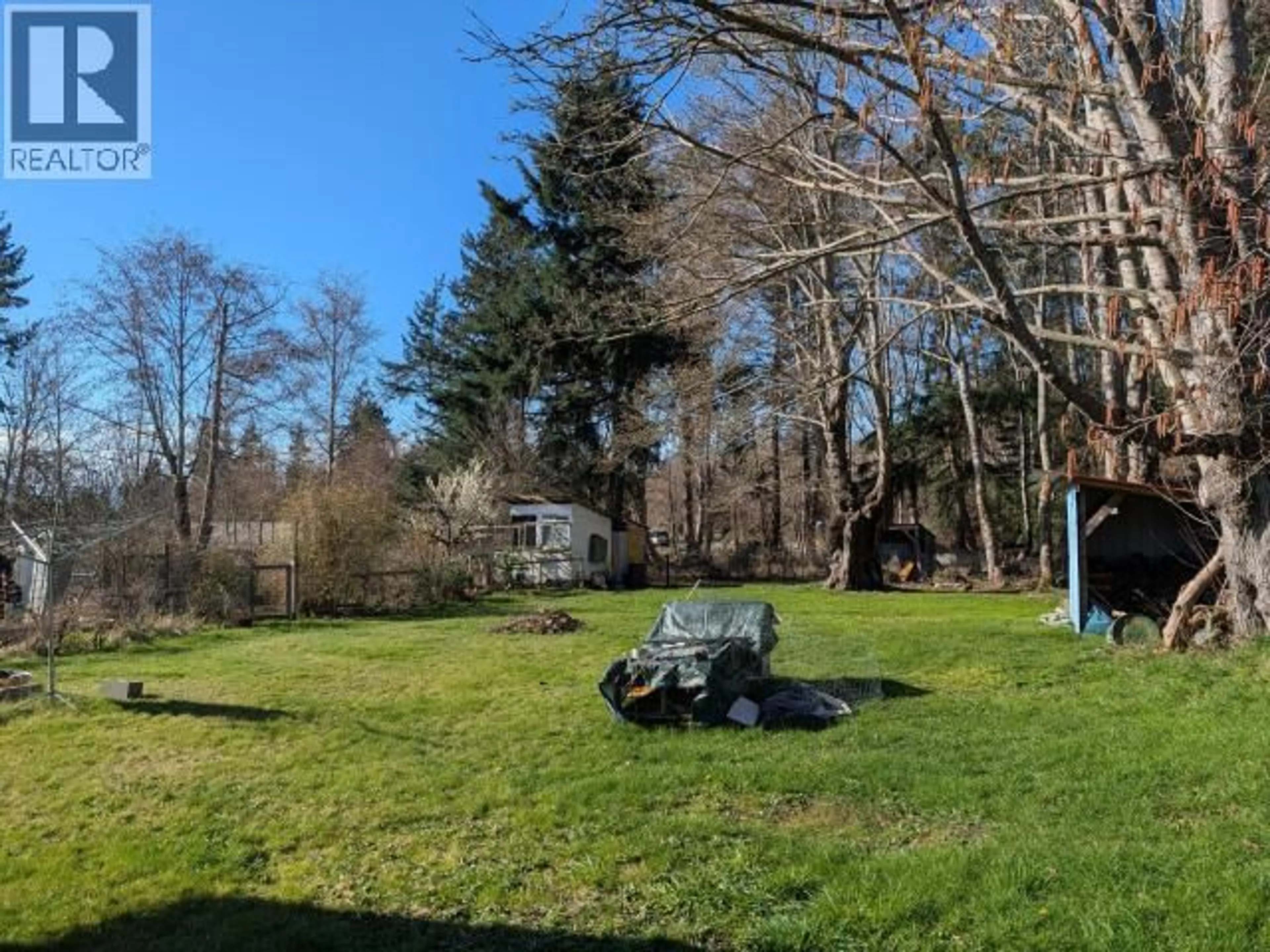 A pic from outside/outdoor area/front of a property/back of a property/a pic from drone, forest/trees view for 4649 CEDAR STREET, Texada Island British Columbia V0N1W0