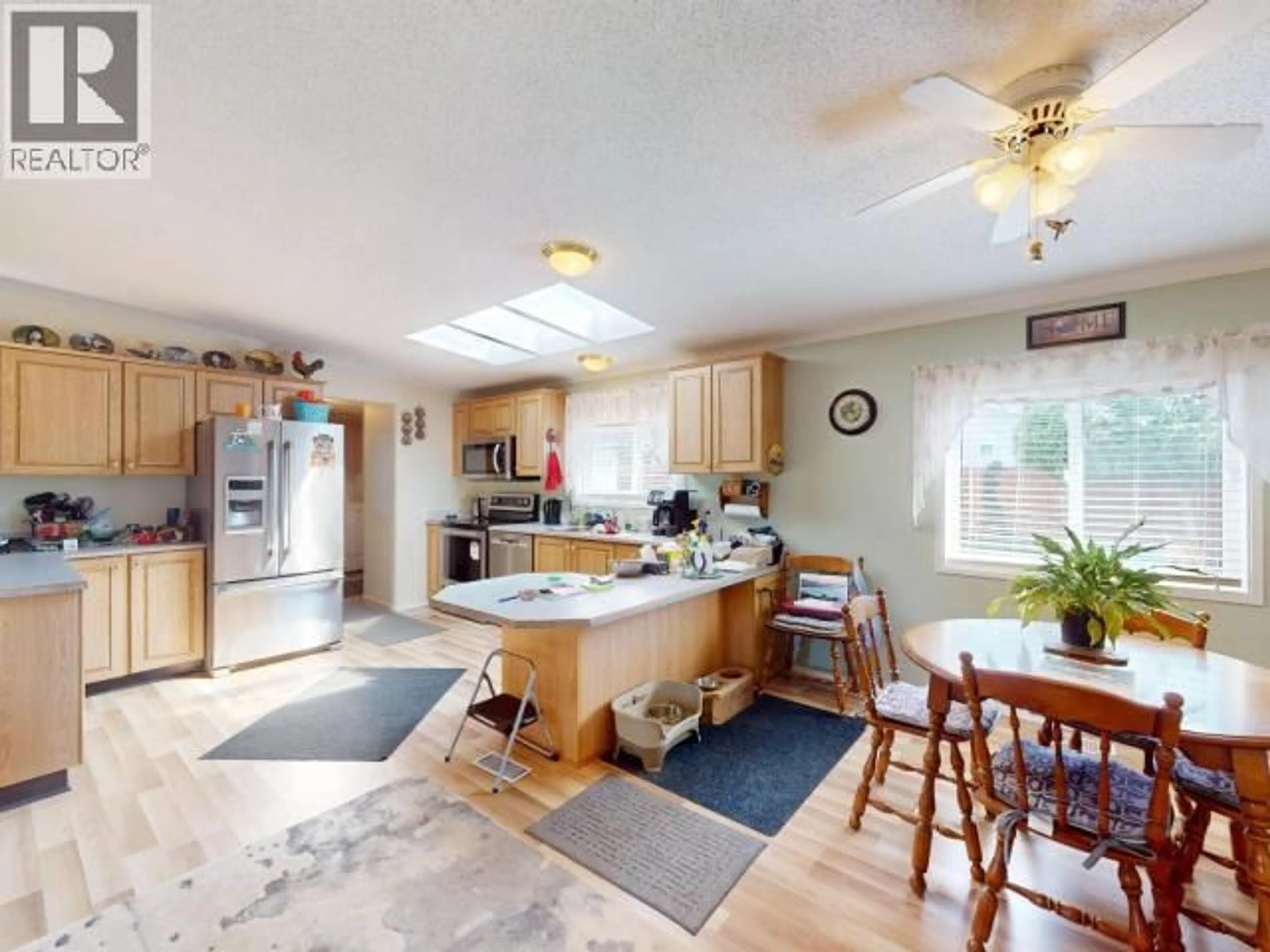 Open concept kitchen, ceramic/tile floor for 7310 COLLINGWOOD WAY, Powell River British Columbia V8A5V2