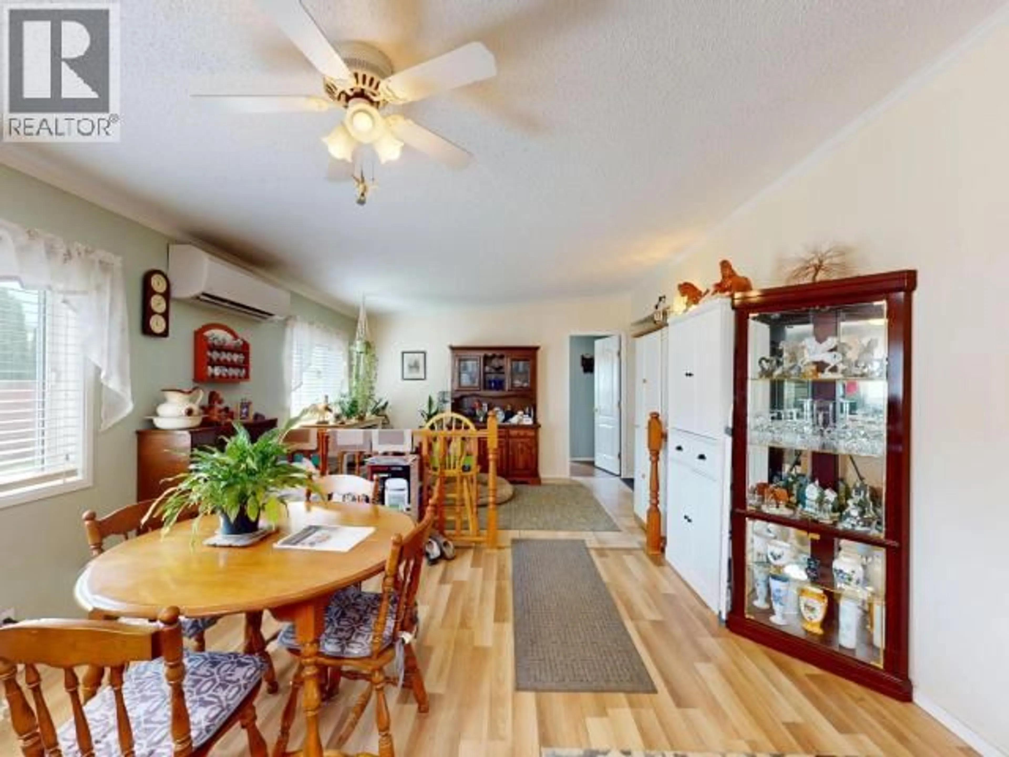 Dining room, wood/laminate floor for 7310 COLLINGWOOD WAY, Powell River British Columbia V8A5V2