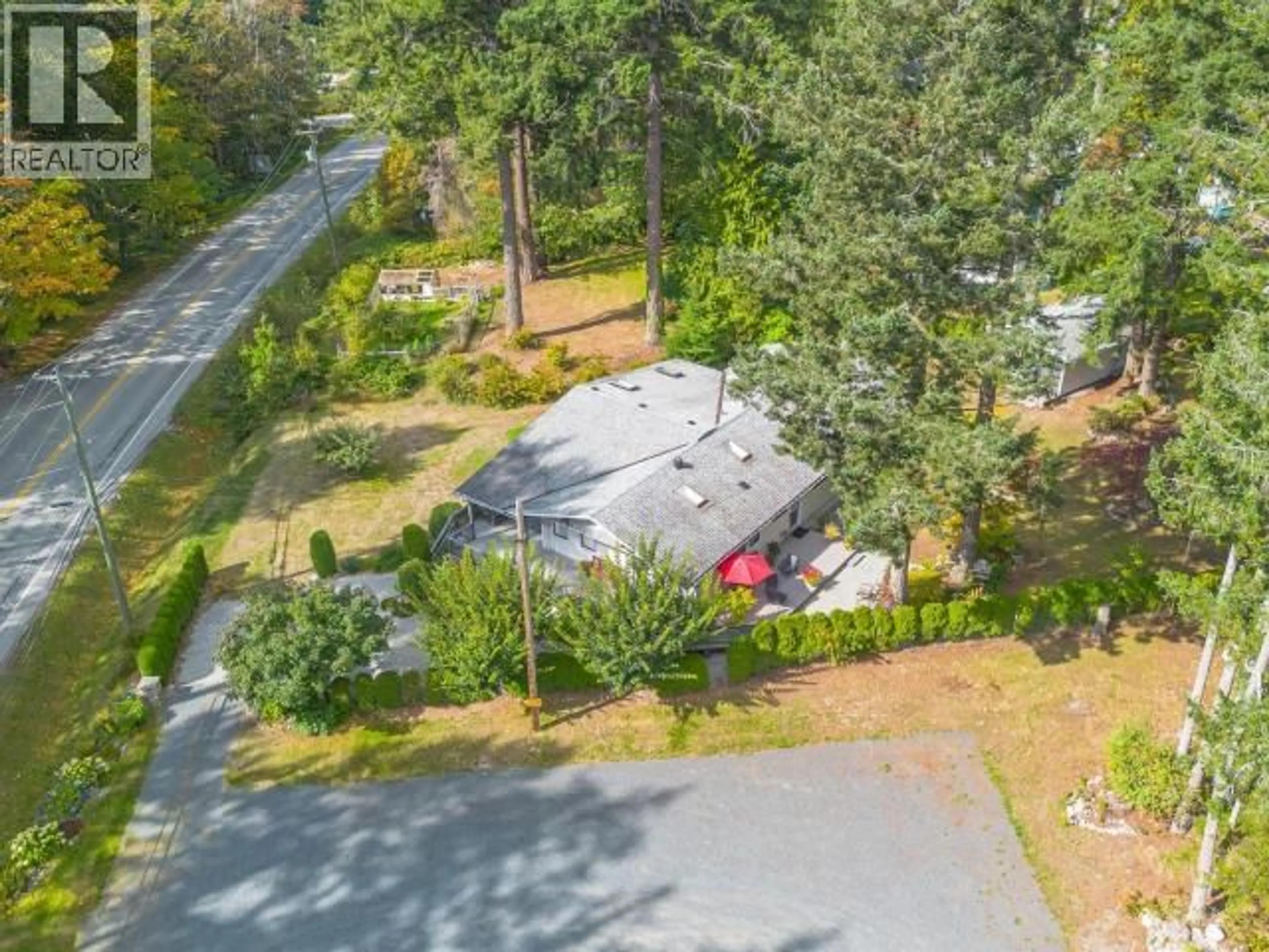 A pic from outside/outdoor area/front of a property/back of a property/a pic from drone, forest/trees view for 11070 HIGHWAY 101, Powell River British Columbia V8A0L5