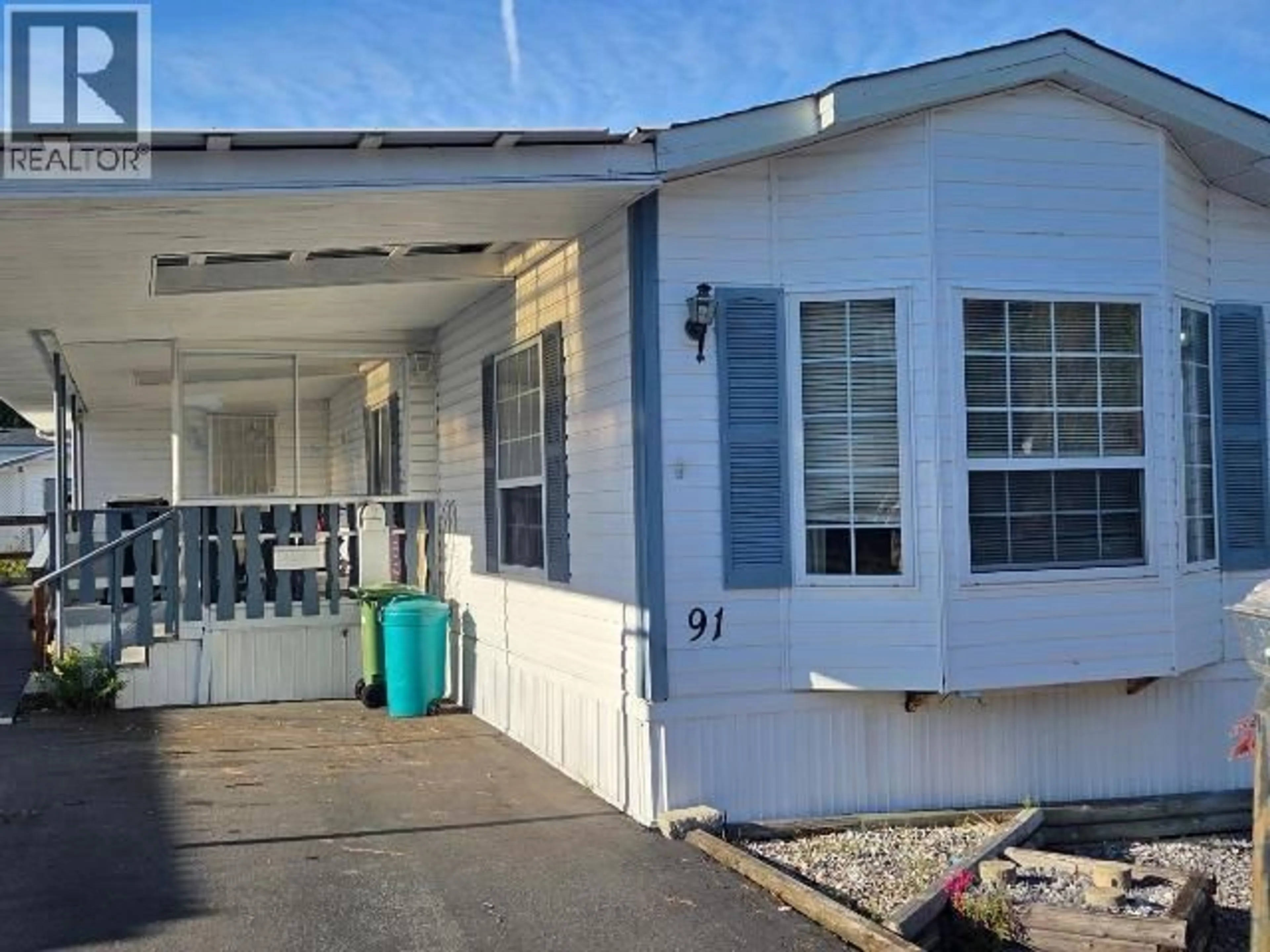 Home with vinyl exterior material, street for 91-7624 DUNCAN STREET, Powell River British Columbia V8A0T2