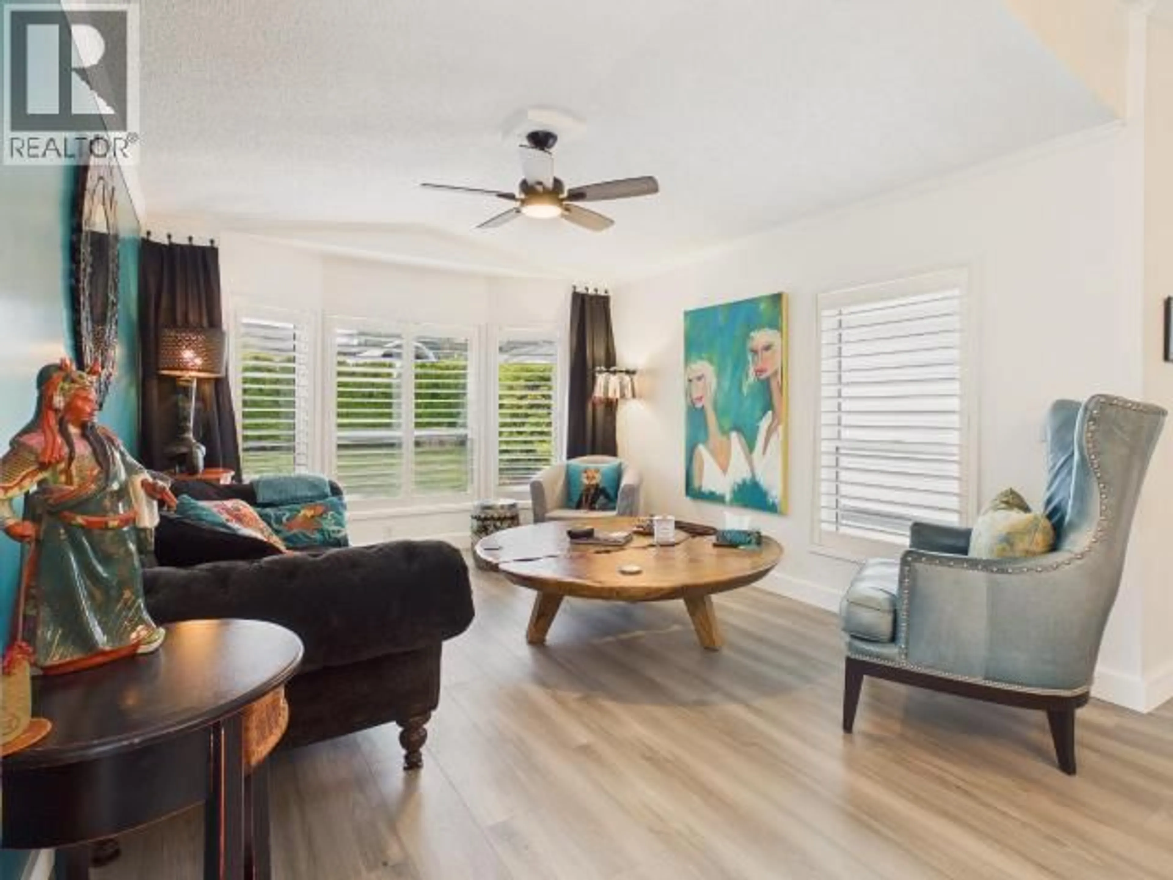Living room with furniture, wood/laminate floor for B - 4291 COLLINGWOOD WAY, Powell River British Columbia V8A5V2