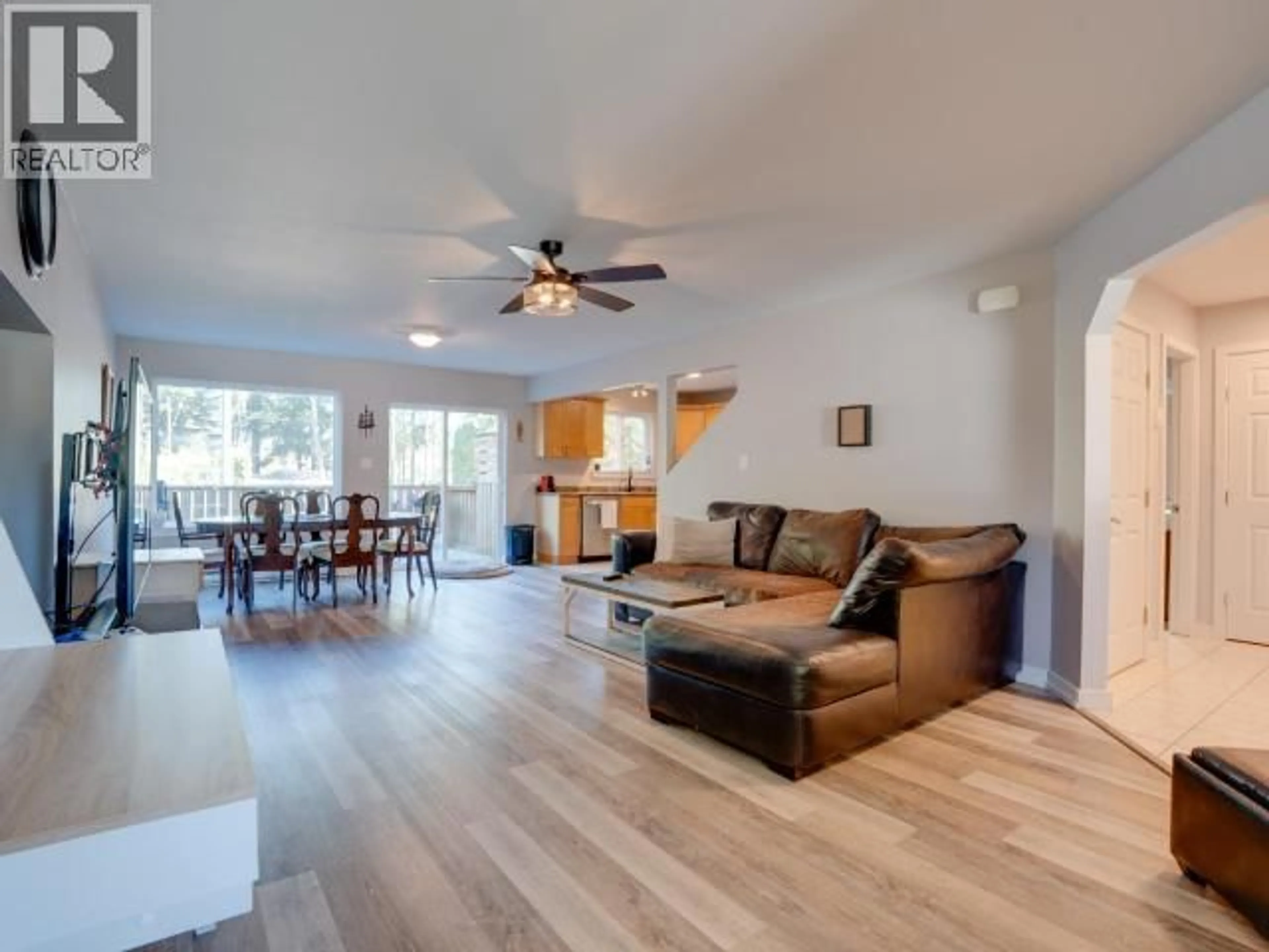 Living room with furniture, wood/laminate floor for 5432 MANSON AVE, Powell River British Columbia V8A3P9