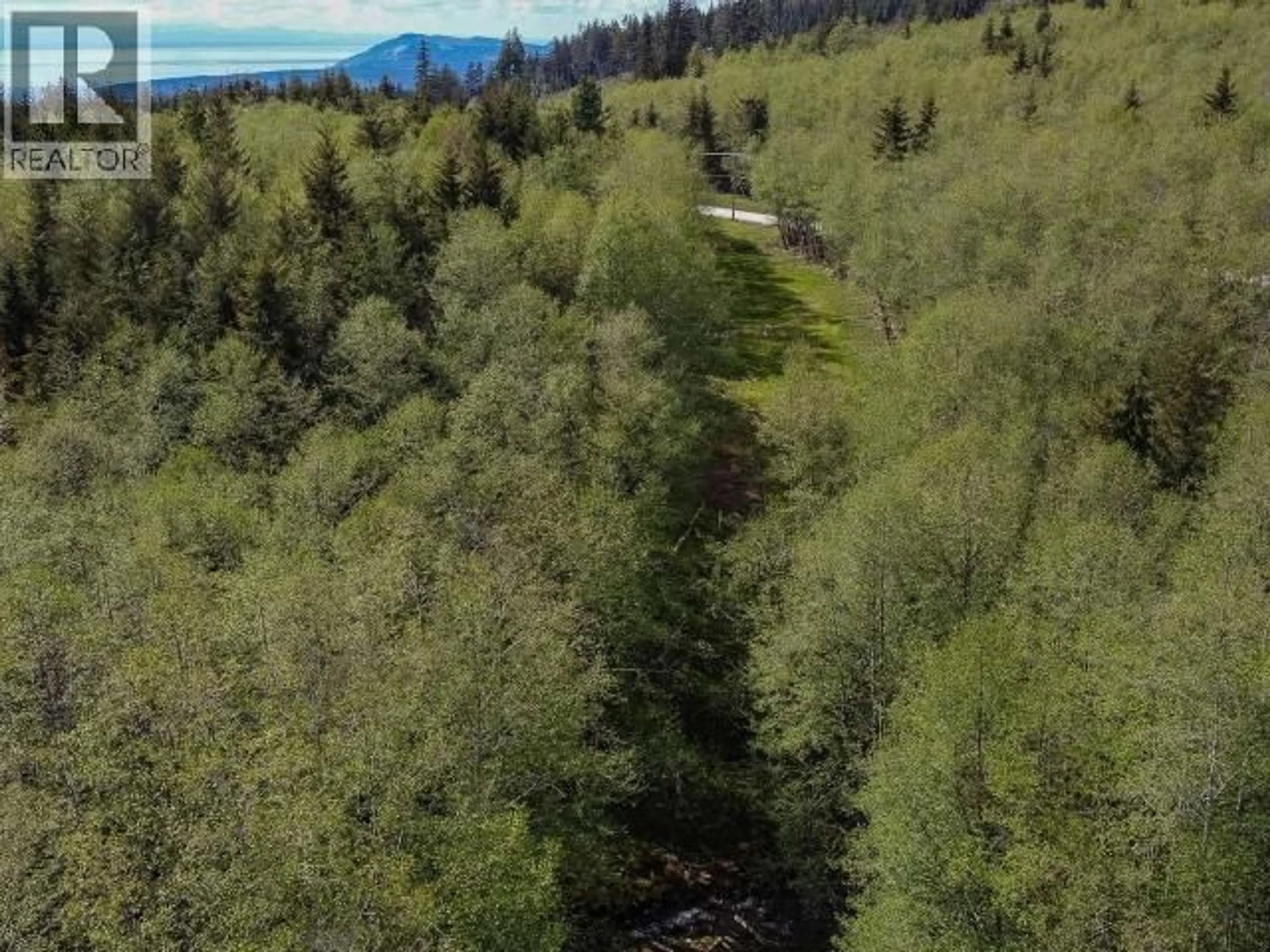 A pic from outside/outdoor area/front of a property/back of a property/a pic from drone, forest/trees view for 6929 SIENNA ROAD, Texada Island British Columbia V0N1W0