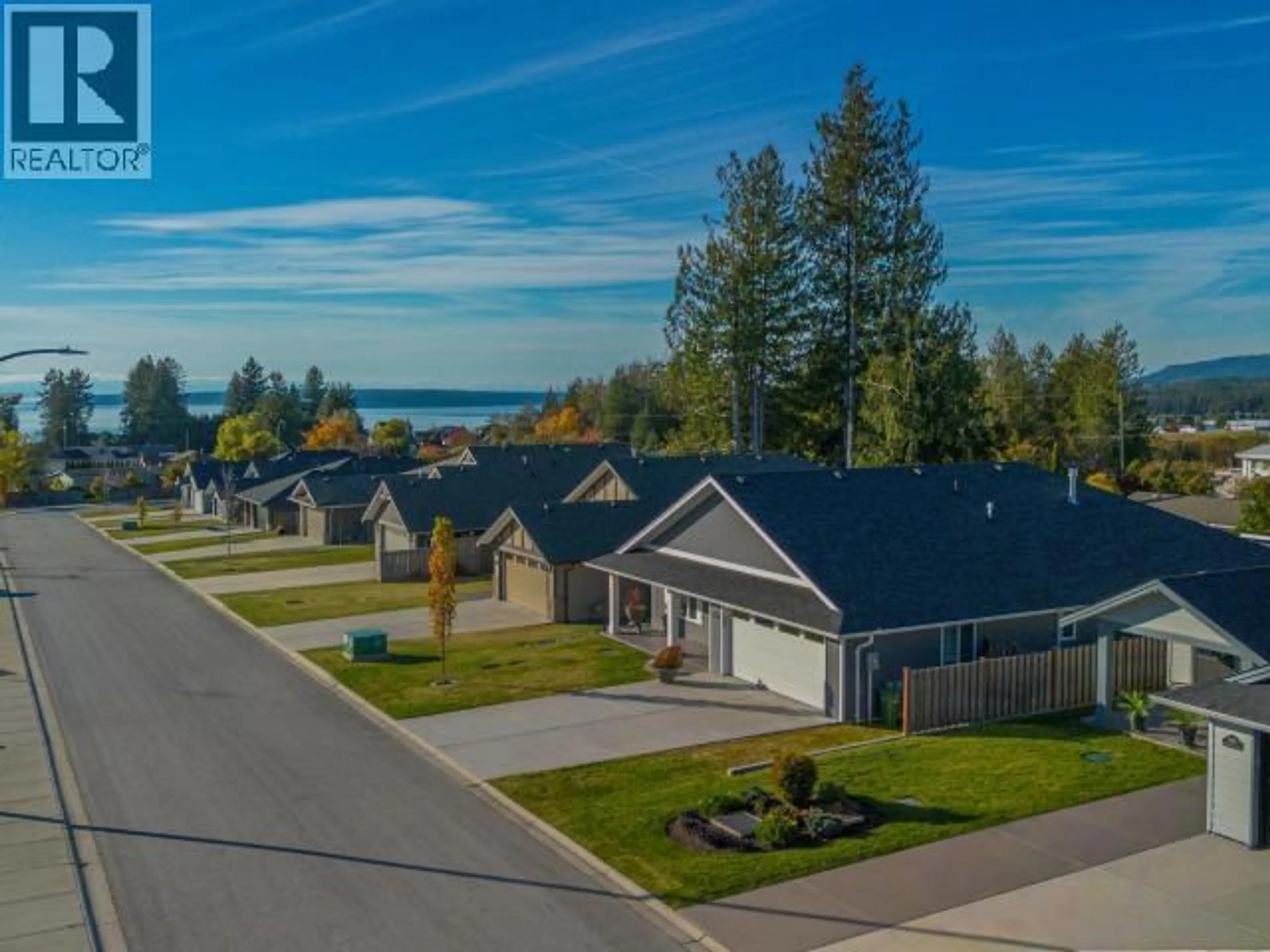 A pic from outside/outdoor area/front of a property/back of a property/a pic from drone, water/lake/river/ocean view for 7452 GABRIOLA CRESCENT, Powell River British Columbia V8A0A9