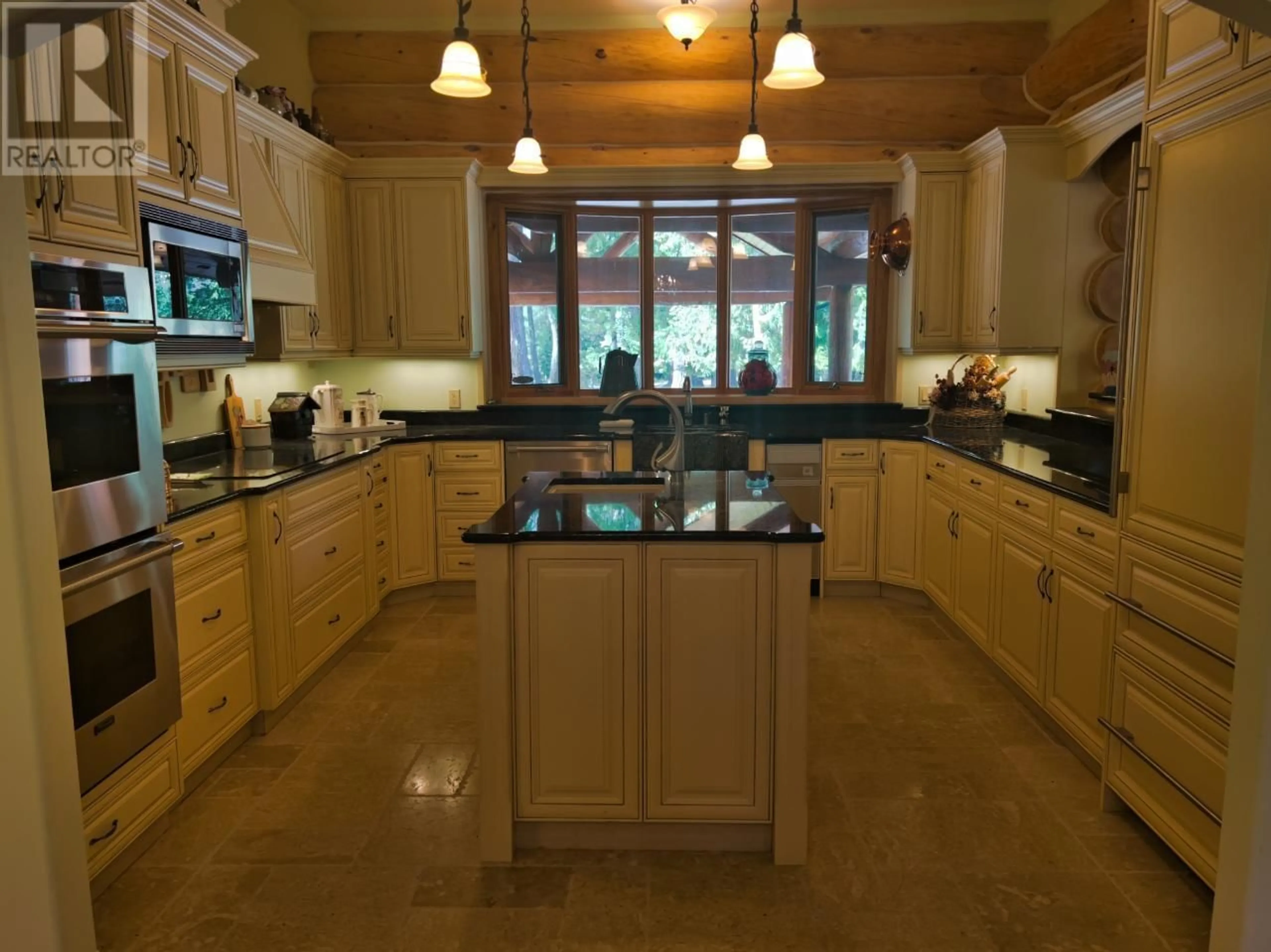Open concept kitchen, ceramic/tile floor for 3775 SYLVESTER ROAD, Creston British Columbia V0B1G1