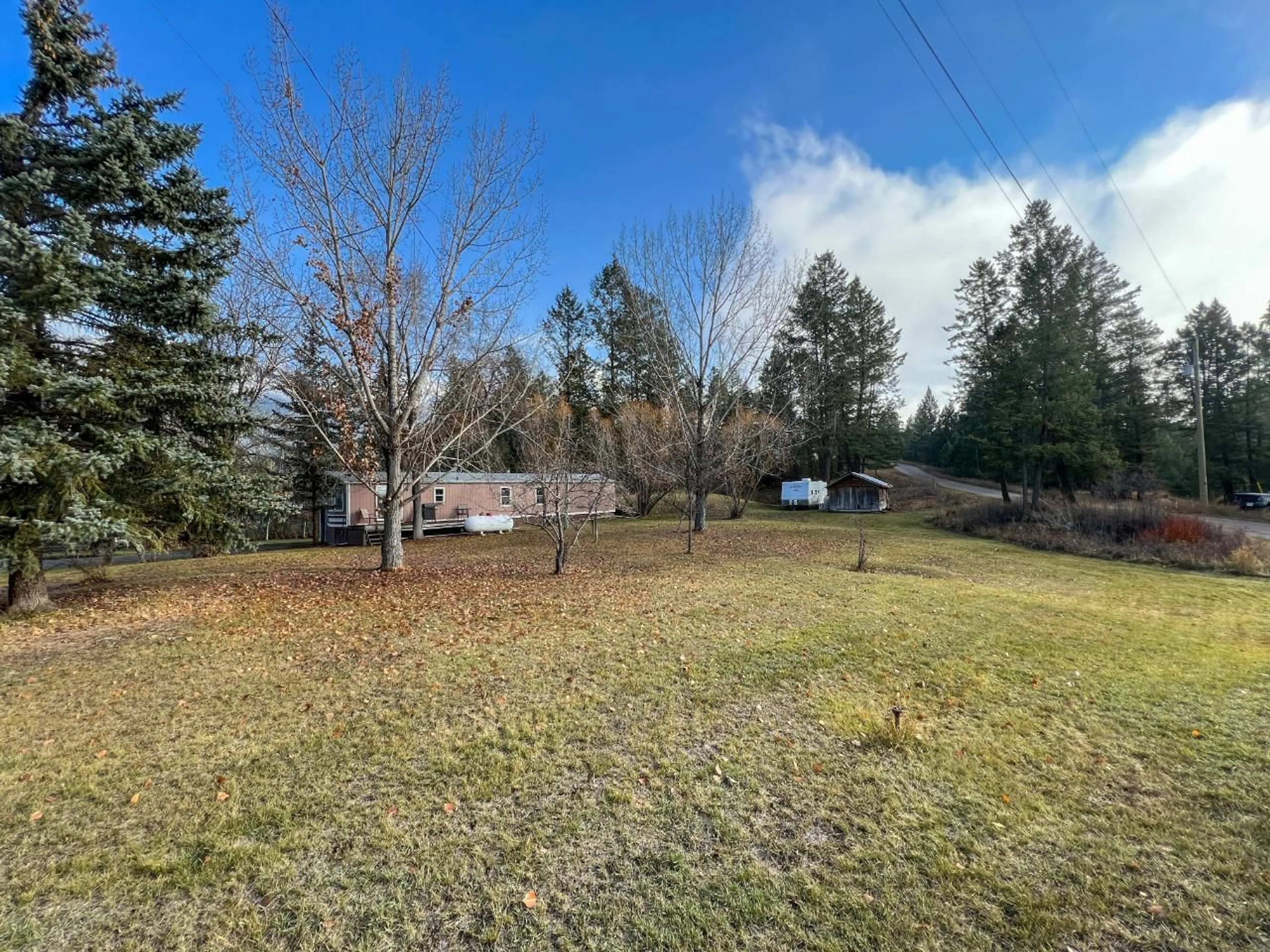 Frontside or backside of a home, the fenced backyard for 5796 SINCLAIR Street, Edgewater British Columbia V0A1E0