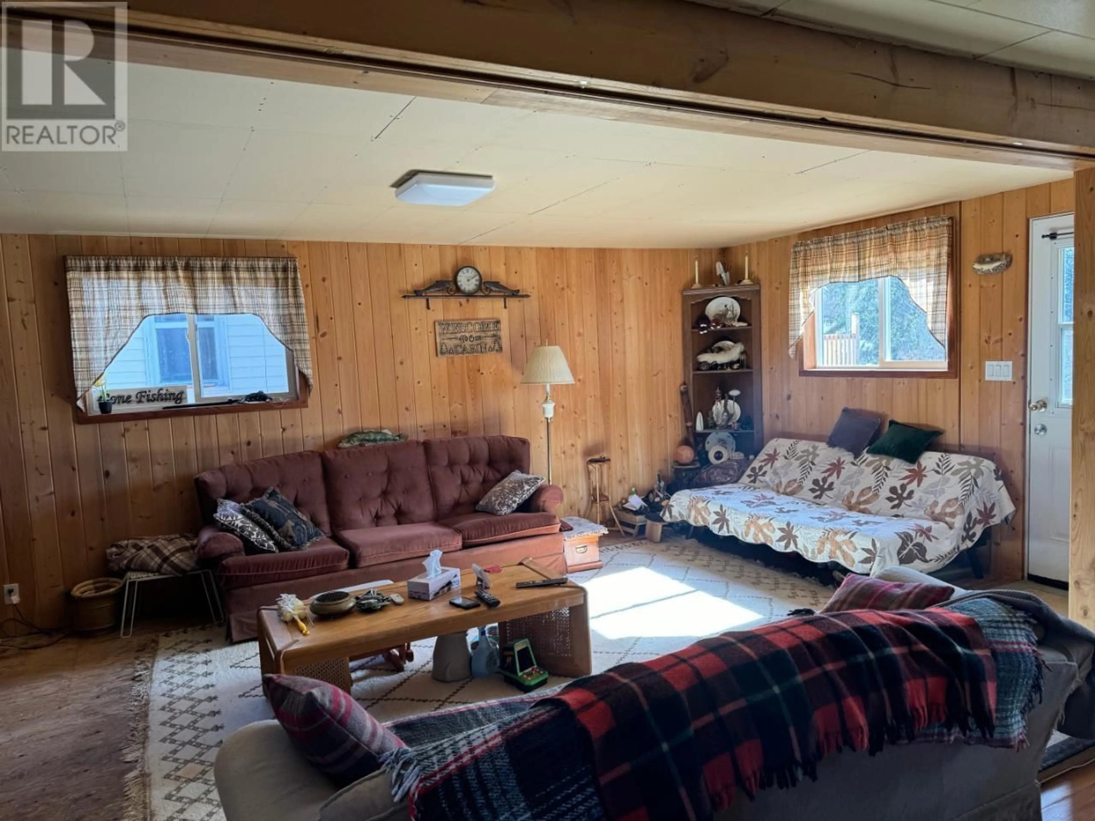 Living room with furniture, unknown for 1005 RAILWAY BOULEVARD, Creston British Columbia V0B1G3