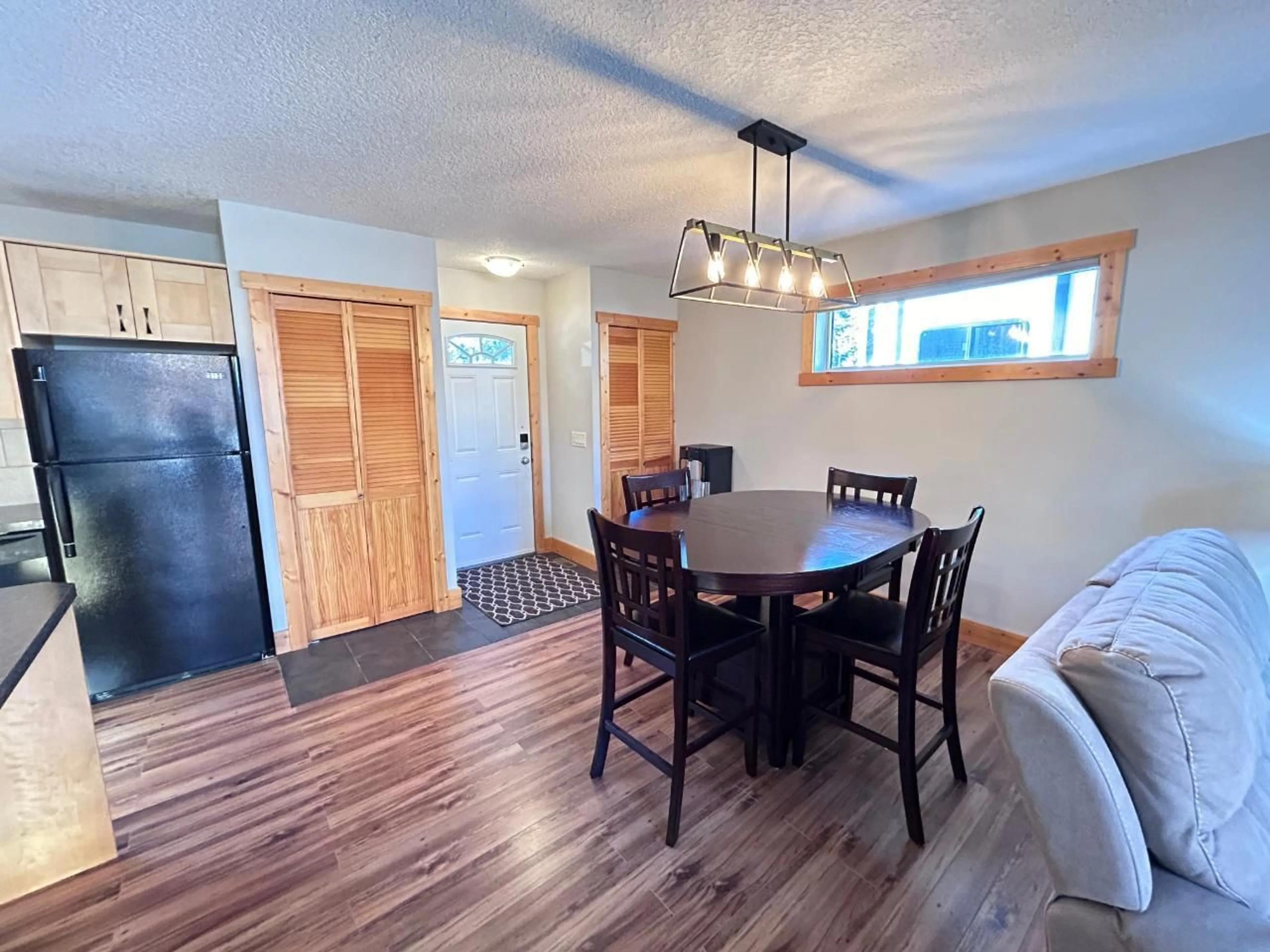 Dining room, wood floors, cottage for 4868 RIVERVIEW Drive Unit# 93, Edgewater British Columbia V0A1A2