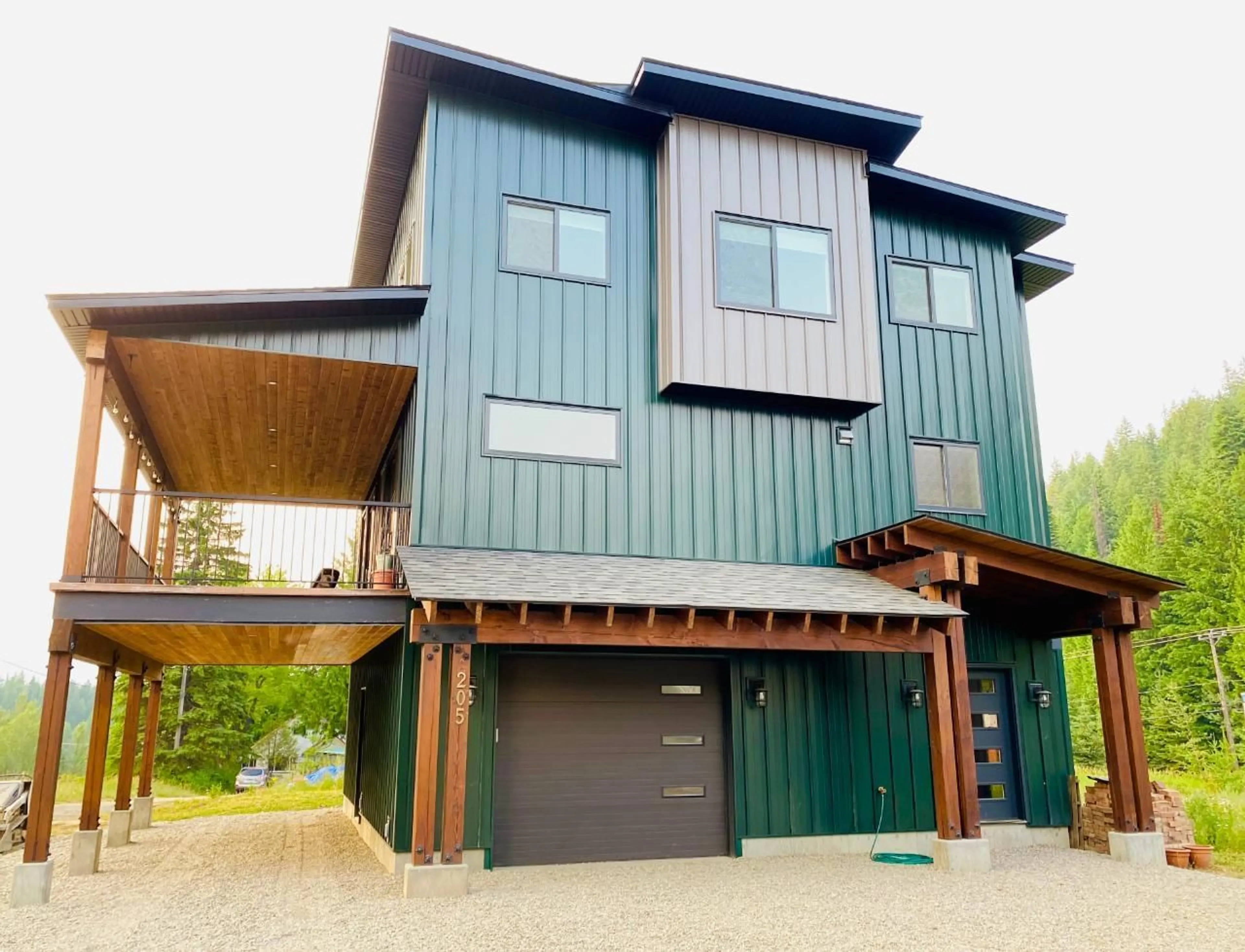 Frontside or backside of a home, the front or back of building for 205 JOLIFFE Way, Rossland British Columbia V0G1Y0