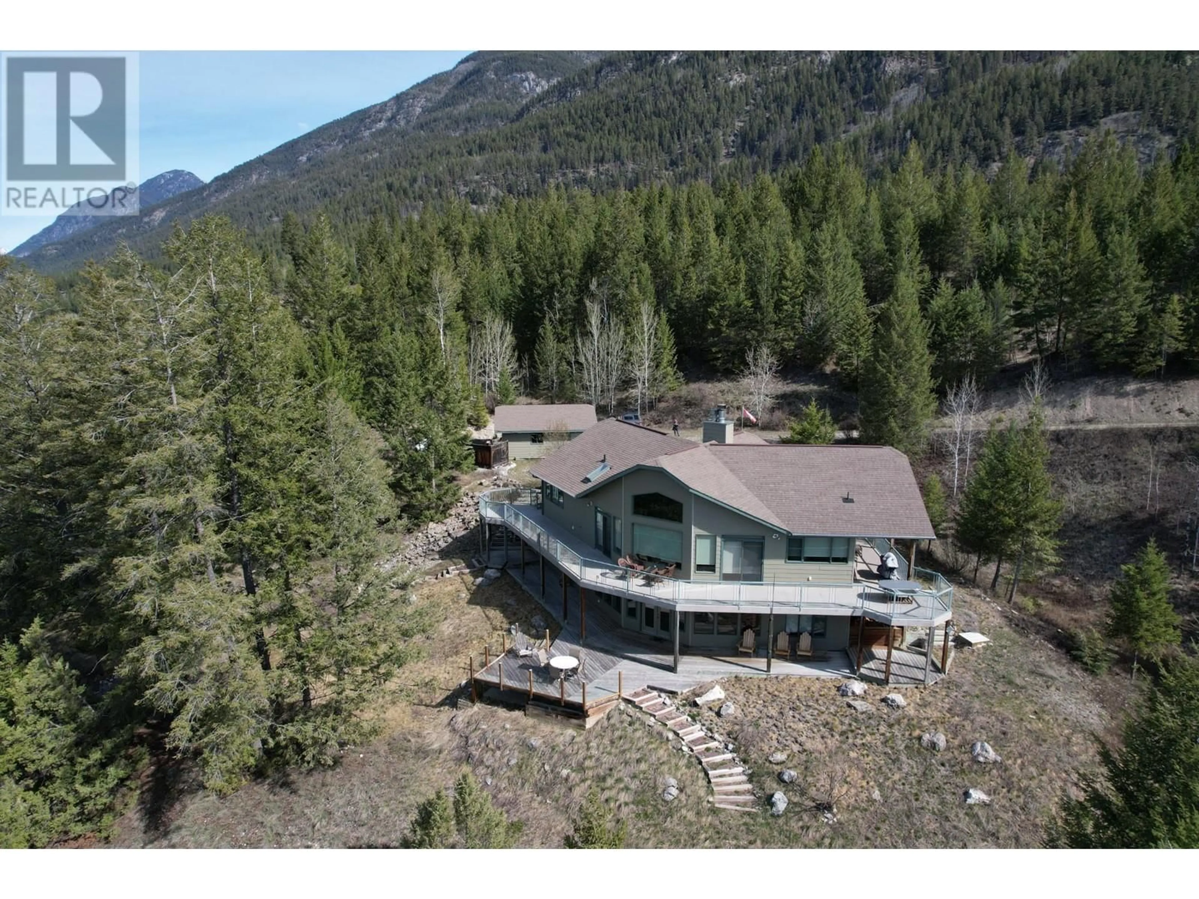 A pic from outside/outdoor area/front of a property/back of a property/a pic from drone, mountain view for 2360/2380 95 HIGHWAY, Spillimacheen British Columbia V0A1P0