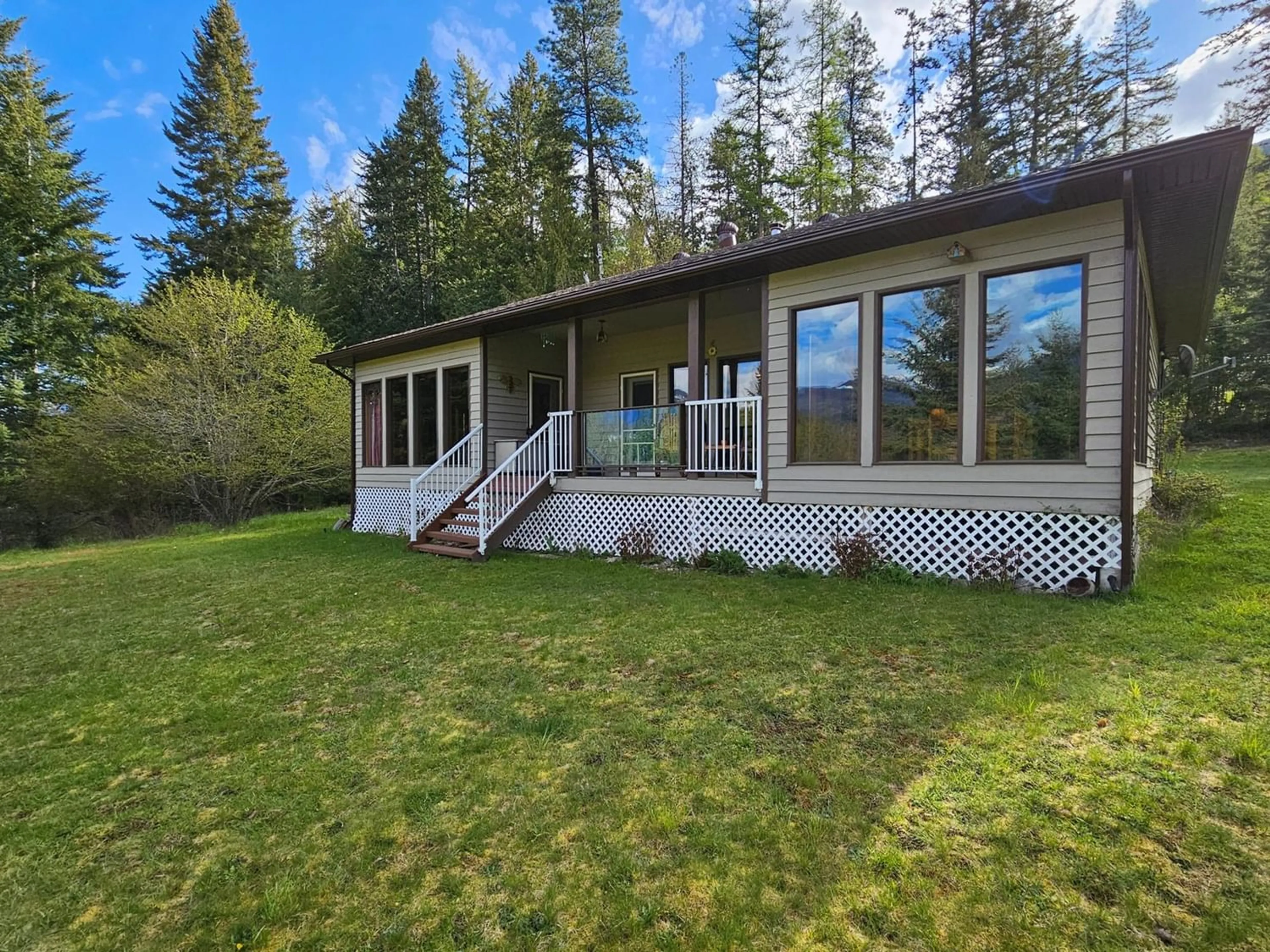 Frontside or backside of a home for 1283 RIONDEL RD, Riondel British Columbia V0B2B0